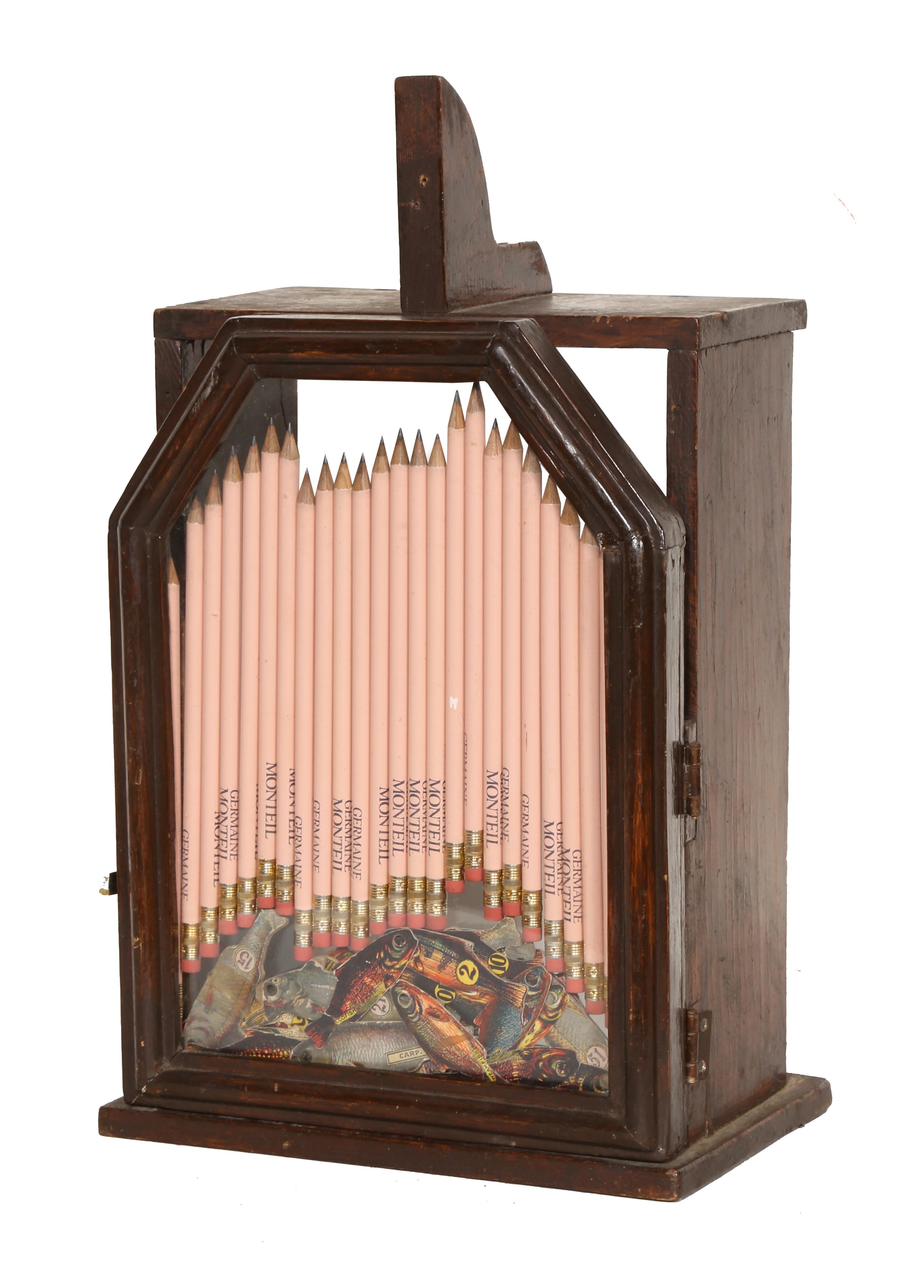 Artist: Arman
Title: Wooden box with Pencils 
Year: Mid-Late 20th Century
Medium: Mixed media, signature etched into glass
Size: 13 x 9 x 6.5 inches