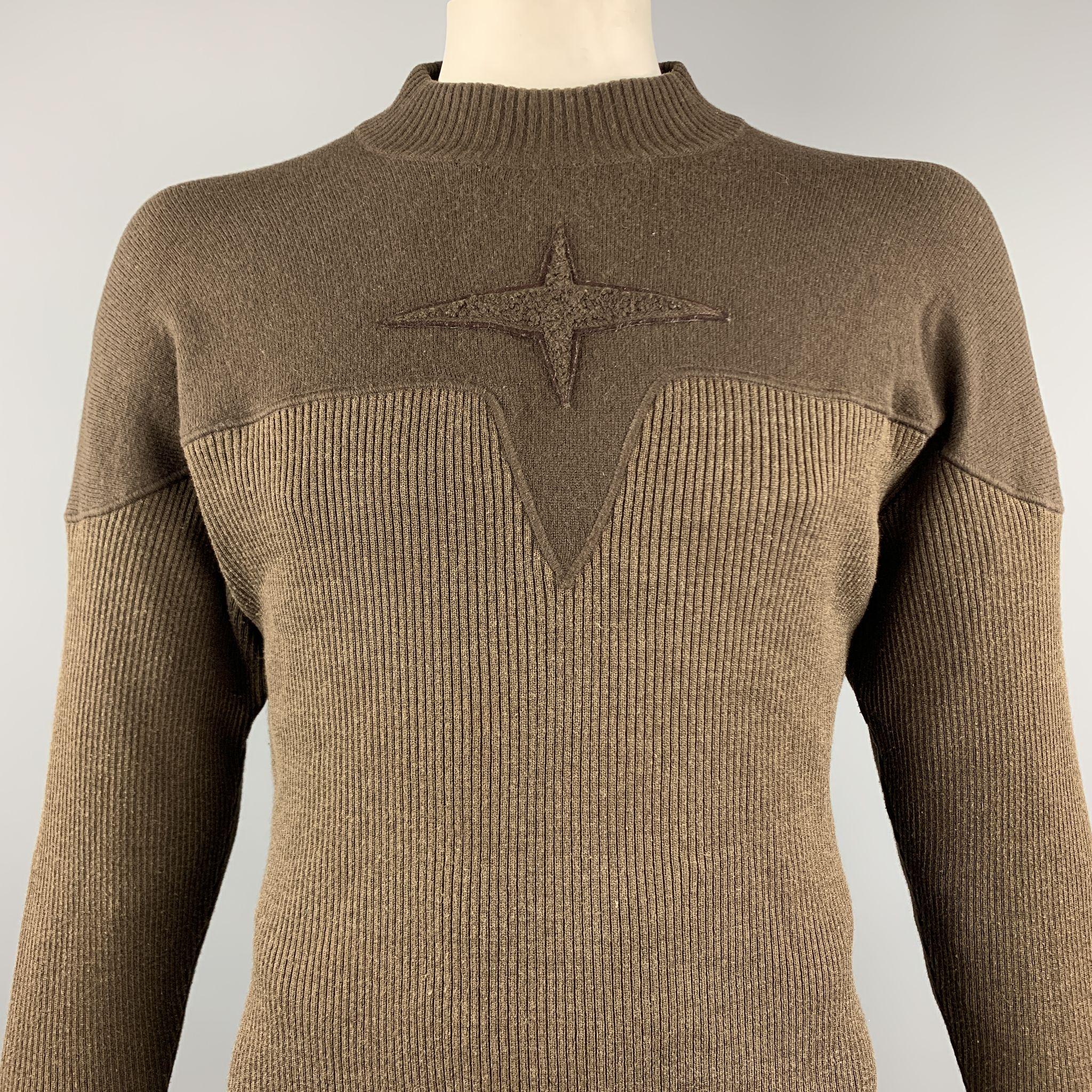 ARMAND BASI pullover comes in a brown ribbed knit wool blend featuring a front star detail and a thick ribbed crew-neck. Made in Spain. 

Very Good Pre-Owned Condition.
Marked: XL

Measurements:

Shoulder: 19 in. 
Chest: 42 in. 
Sleeve: 26.5 in.
