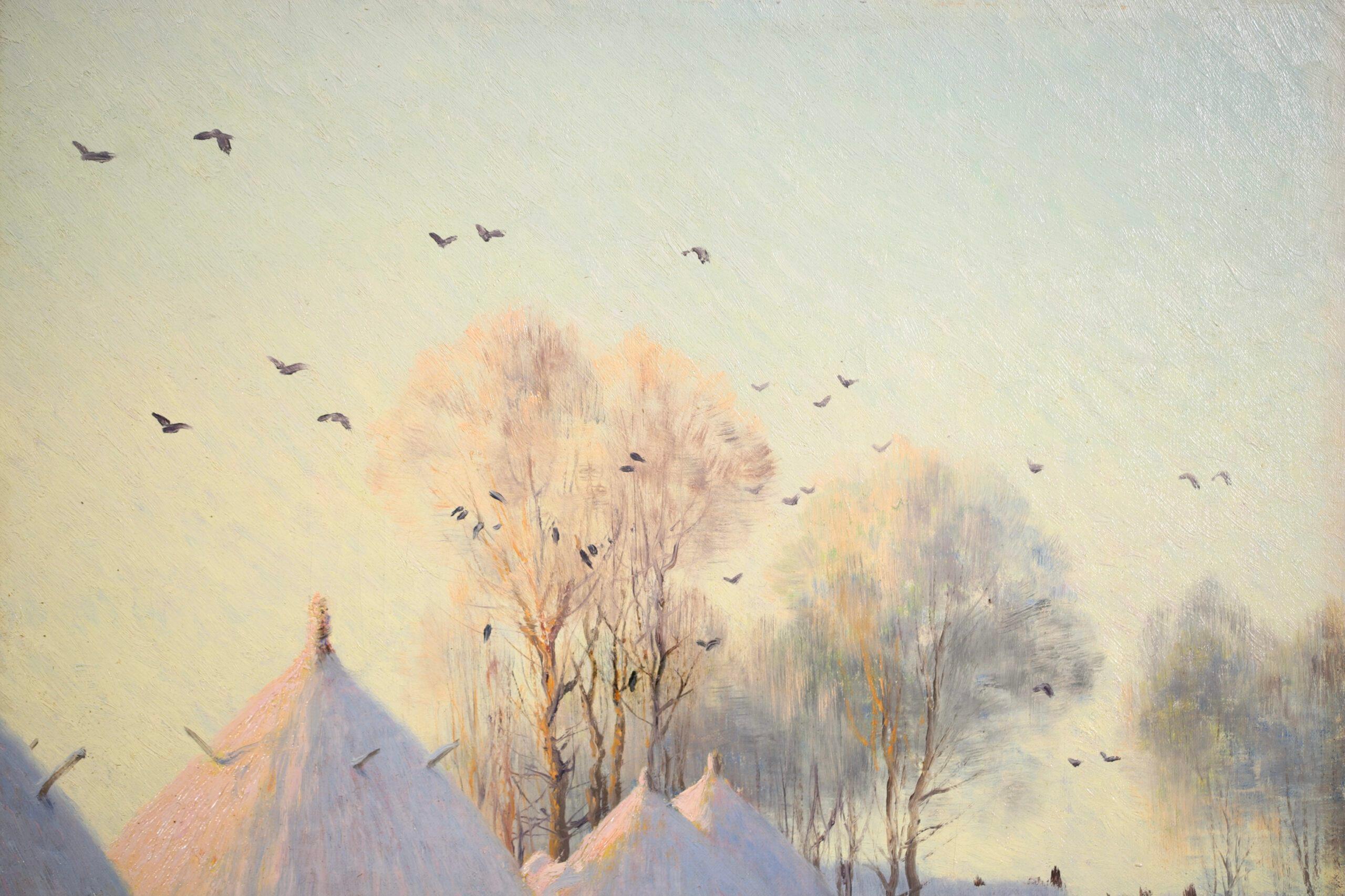 Signed and dated impressionist oil on canvas landscape by French painter Armand Guery. The work depicts a rural winter scene with snow covered haystacks to the left and the trees and snowy rooftops of the nearby village in the distance. Birds fly