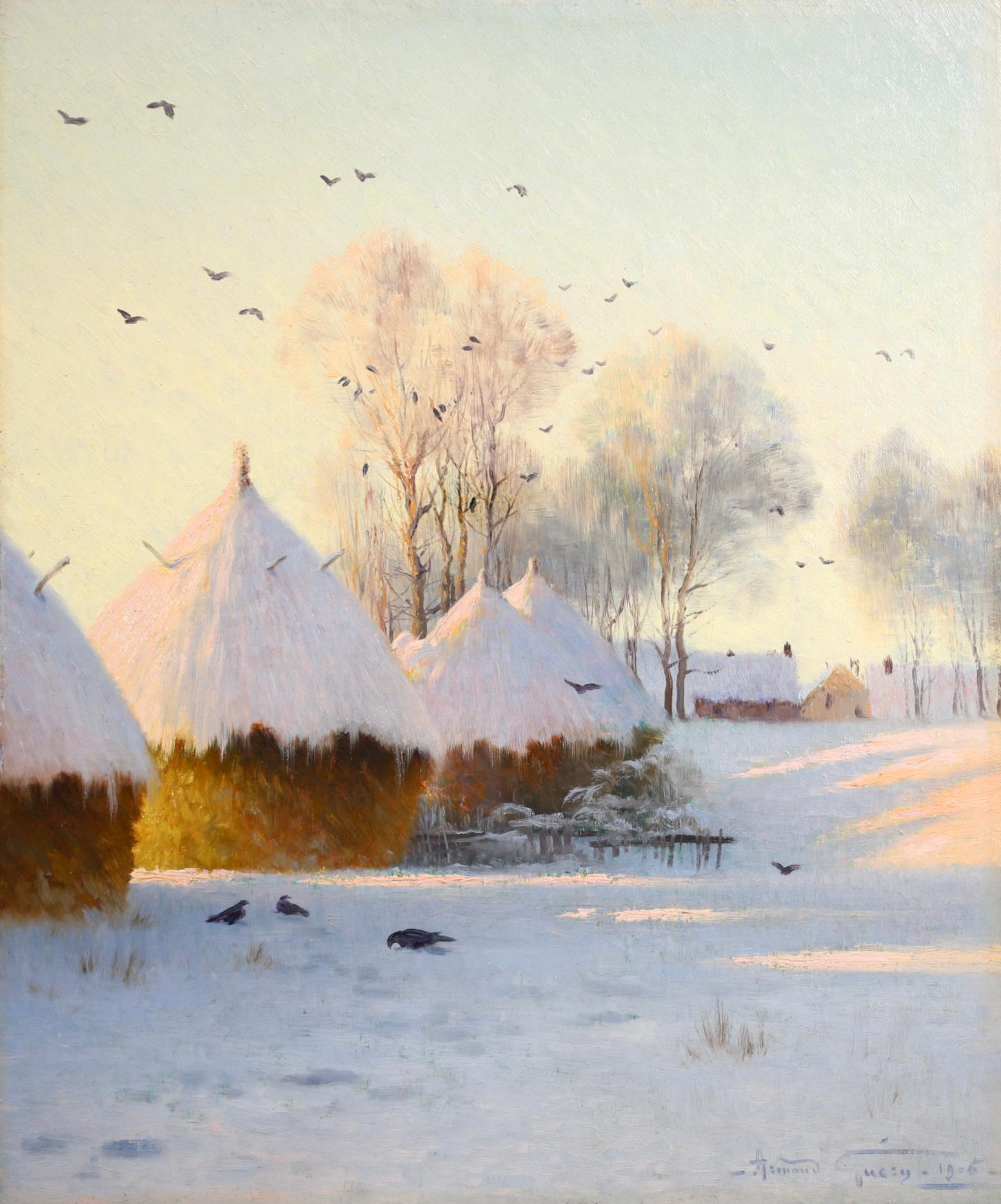 Signiert und datiert impressionistische Öl auf Leinwand Landschaft von Französisch Maler Armand Guery. Das Werk zeigt eine ländliche Winterszene mit schneebedeckten Heuschobern auf der linken Seite und den Bäumen und verschneiten Dächern des nahe