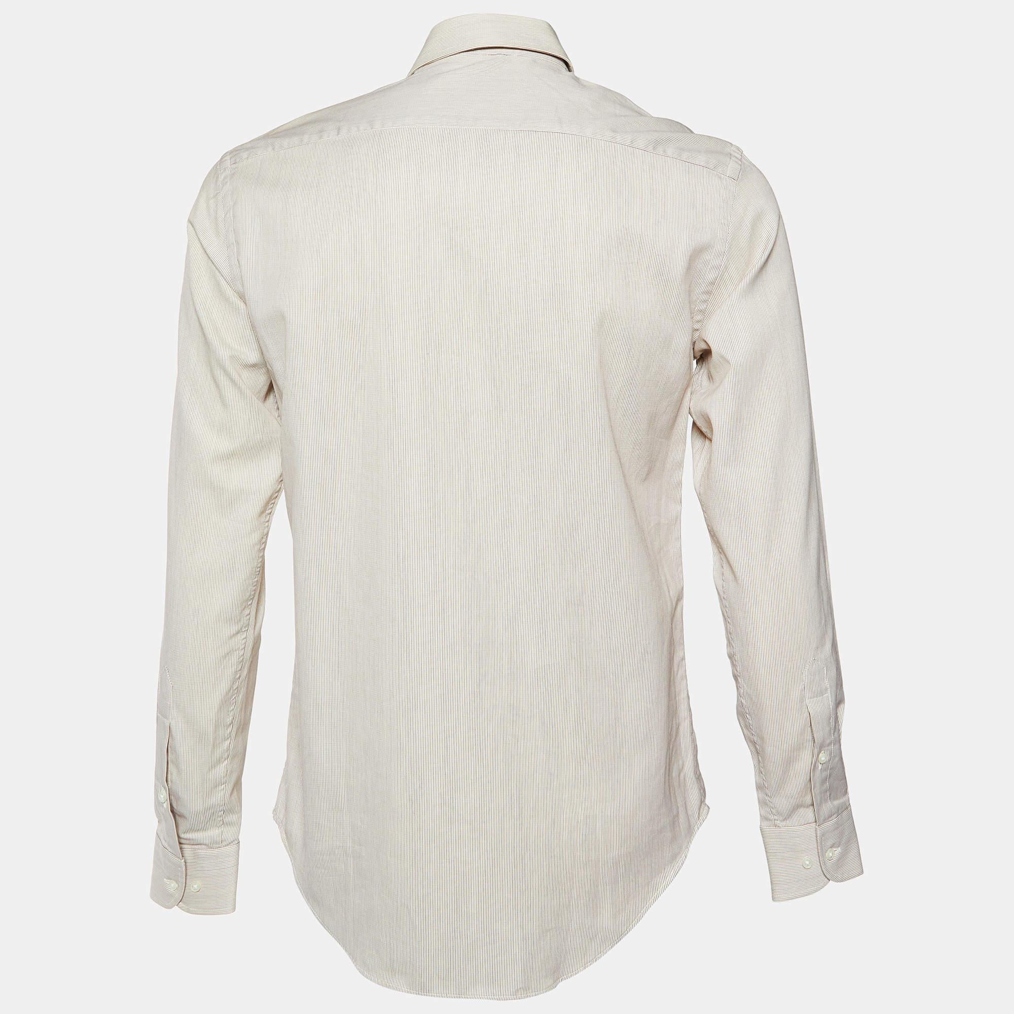Shirts are an indispensable part of a wardrobe so this brand brings you a creation that is both versatile and stylish. It has been tailored from quality material in a versatile shade. The shirt is detailed with signature elements and a comfortable