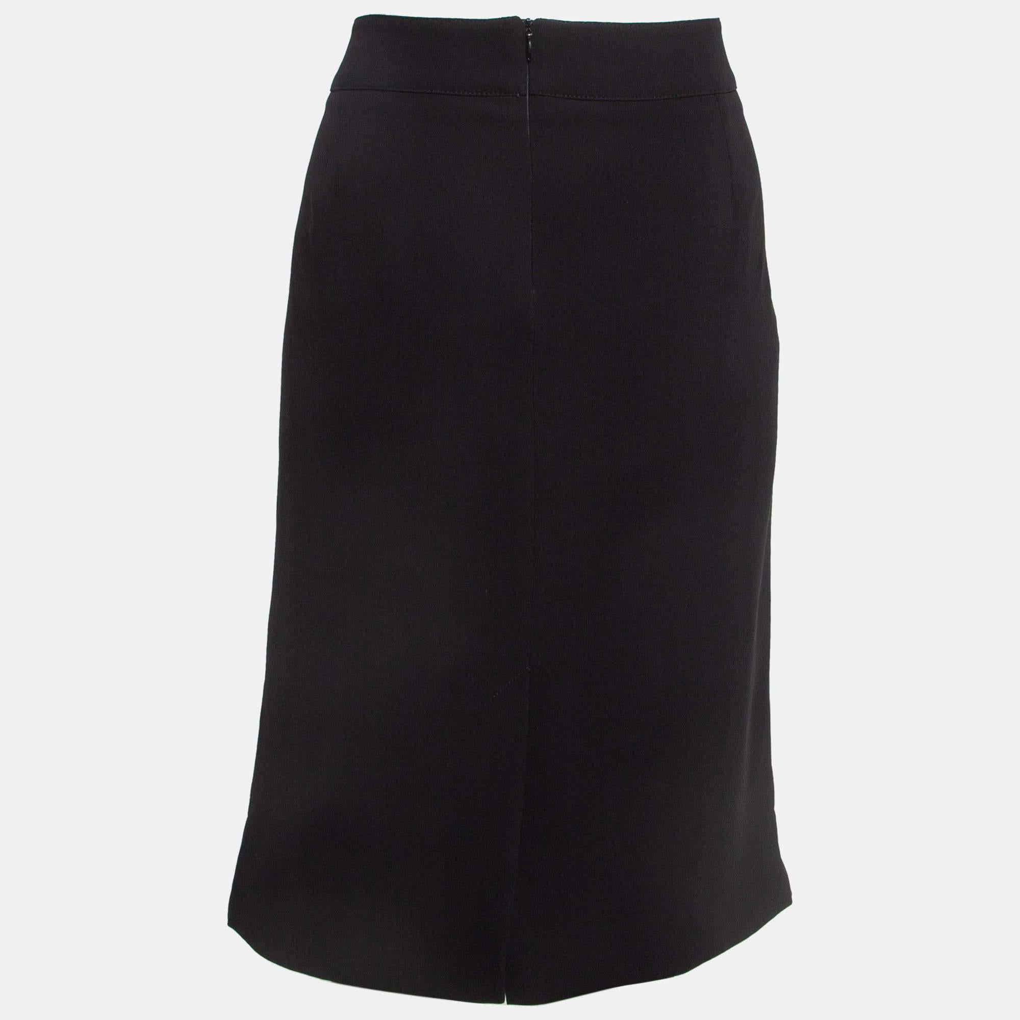 This lovely skirt is beautifully stitched from fine fabric. The comfy designer skirt has a flattering silhouette. Pair it with a simple top and strappy heels for a chic look.