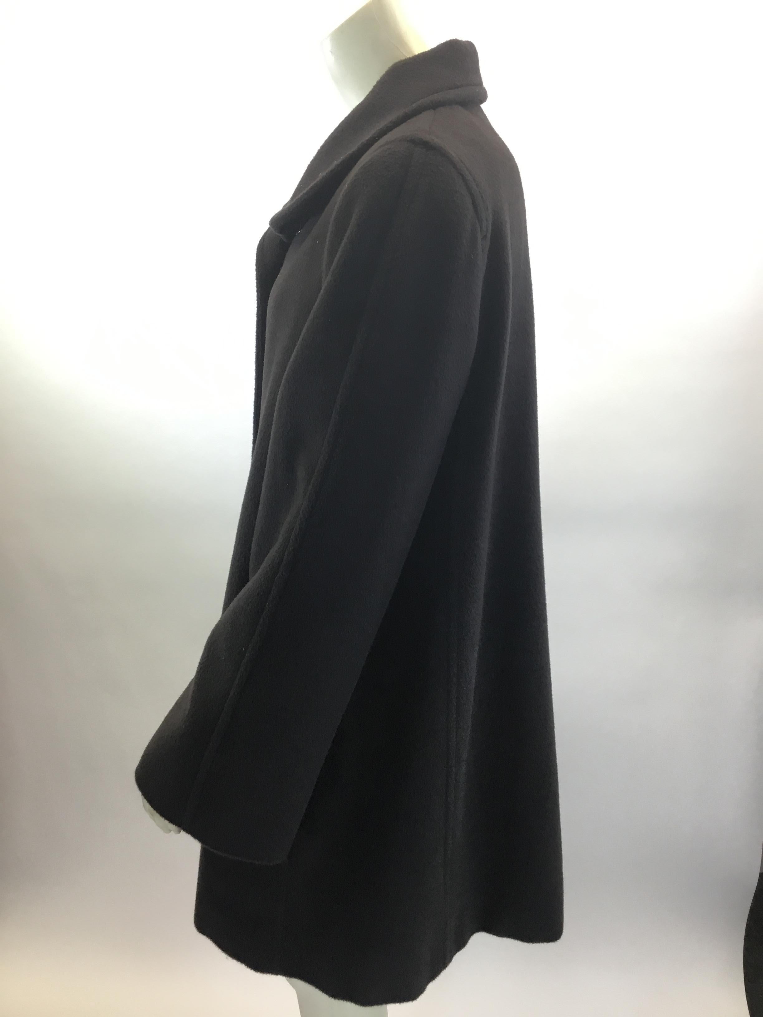 Armani Collezioni Brown Wool and Cashmere Coat
$450
Made in Italy
92% Wool, 8% Cashmere
Size 42
Length 34.5”
Bust 40”
Waist 41”