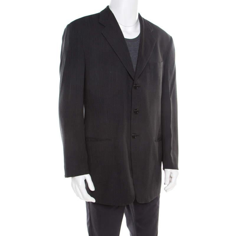 This Herringbone blazer from Armani Collezioni has been tailored to perfectly express the style of the modern man. It is made from wool and it flaunts notched lapels, along with front buttons and pockets. Pair it with trousers, a neat shirt, and