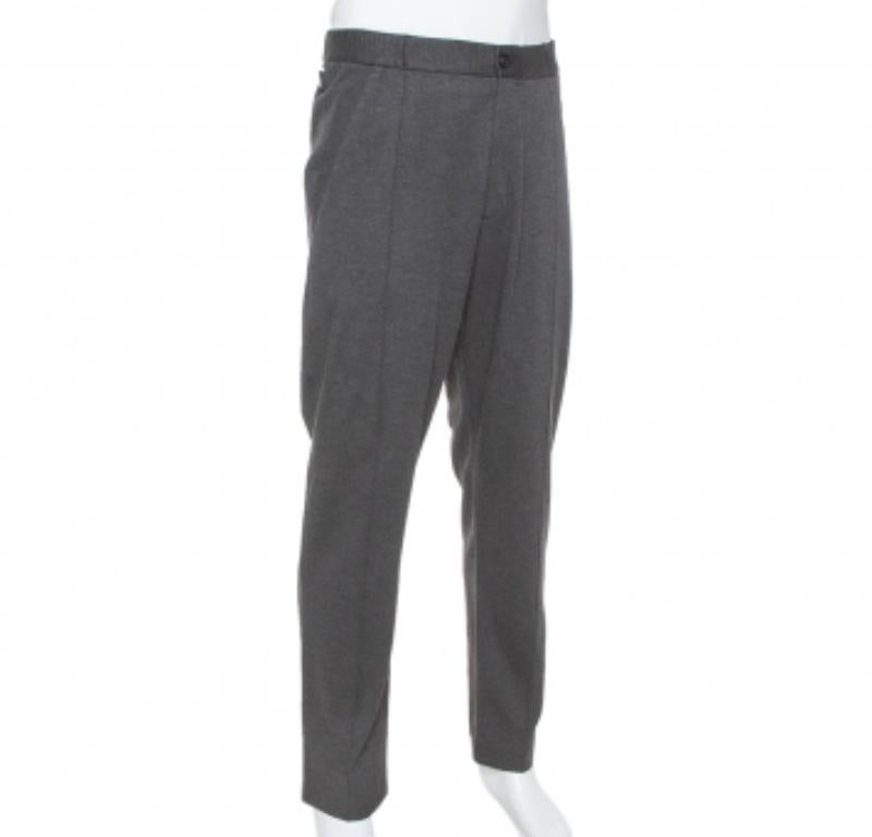 Armani Collezioni makes looking good easy, courtesy of these knit trousers. Cut with a tapered fit in a dark grey tone, these are a pair to feel great in. It features a waistband with a zip fastening and a good fit.