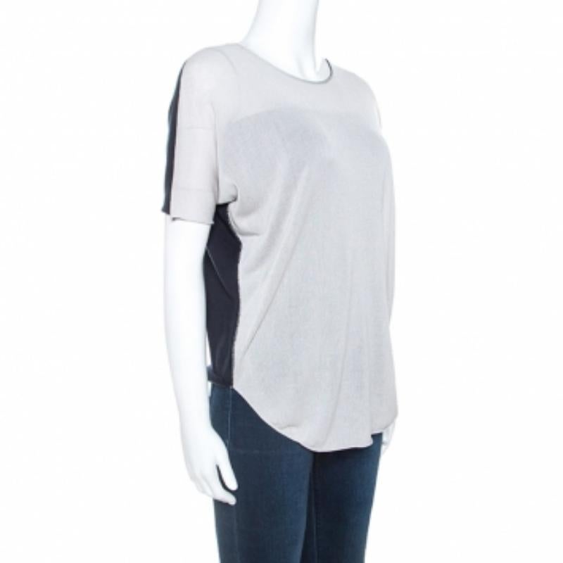 Dieses Modell von Armani Collezioni ist für seine tragbaren Designs bekannt und darf in Ihrer Sammlung nicht fehlen. Er hat eine graue Vorderseite und eine kontrastierende Rückseite. Dieses Oberteil ist aus feinsten Stoffen gefertigt und verbindet