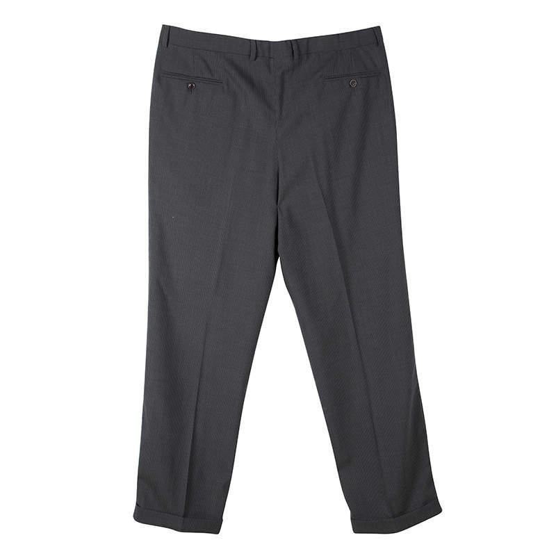 These trousers from Armani Collezioni are so well-tailored, you'll love flaunting them everywhere. It is made of a wool blend and features a well-tailored style. The trousers carry pockets, belt loops, and pinstripes all over. It will look fabulous