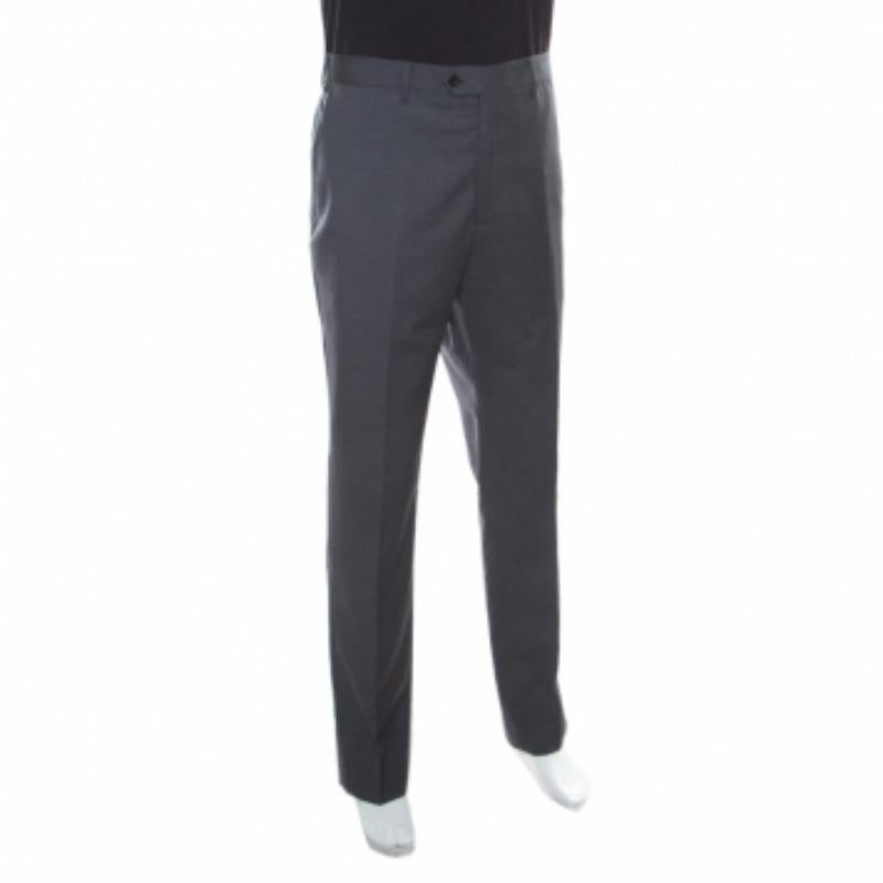 Every wardrobe deserves a good pair of trousers and what better than this pair from Armani Collezioni! The grey tailored trousers are made of 100% wool and feature a simple structured silhouette. They flaunt a front button and zip fastening, belt