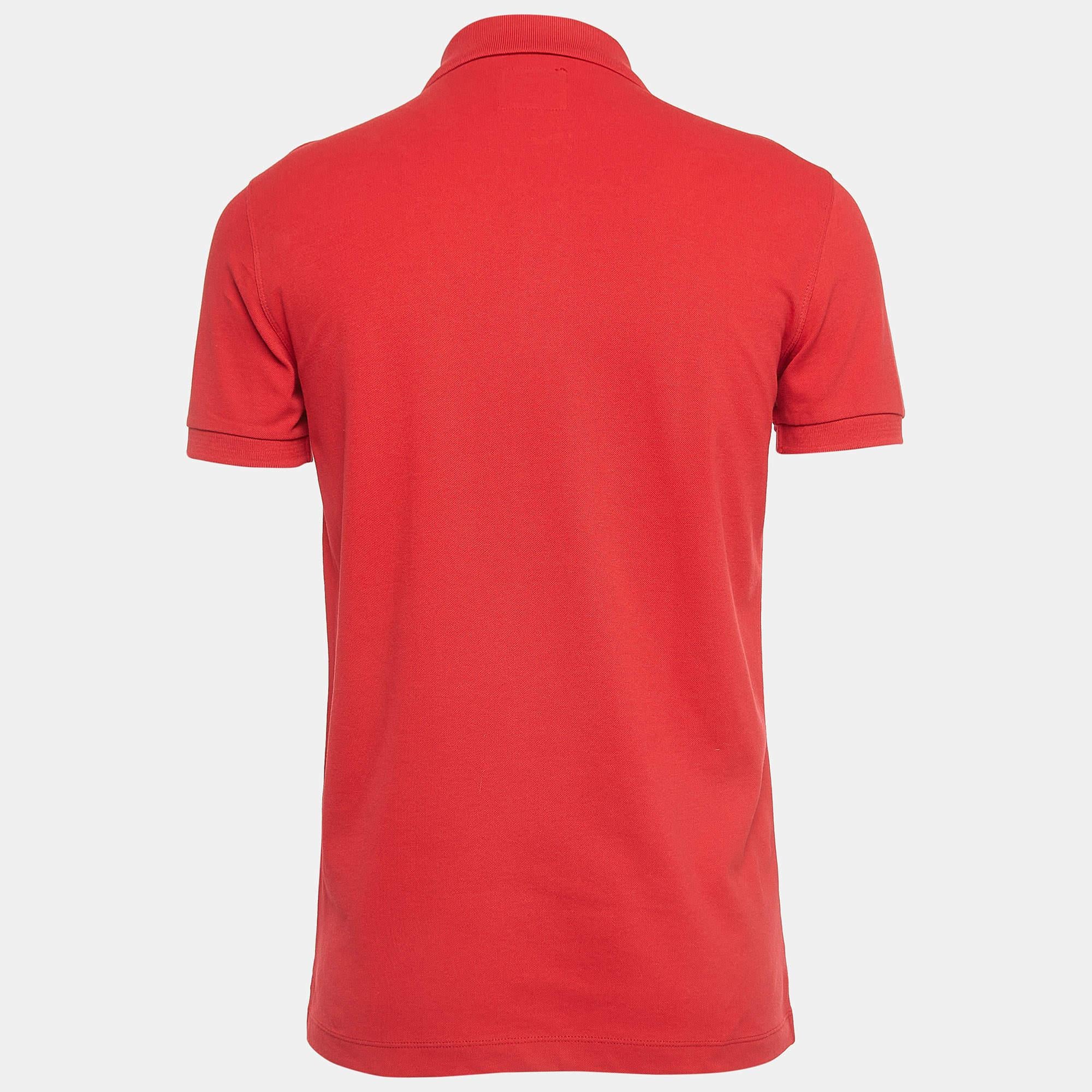 Elevate your everyday style with this meticulously crafted red Polo T shirt. Impeccable tailoring ensures a perfect fit while the breathable fabric offers unparalleled ease. The creation fuses fashion and comfort seamlessly.