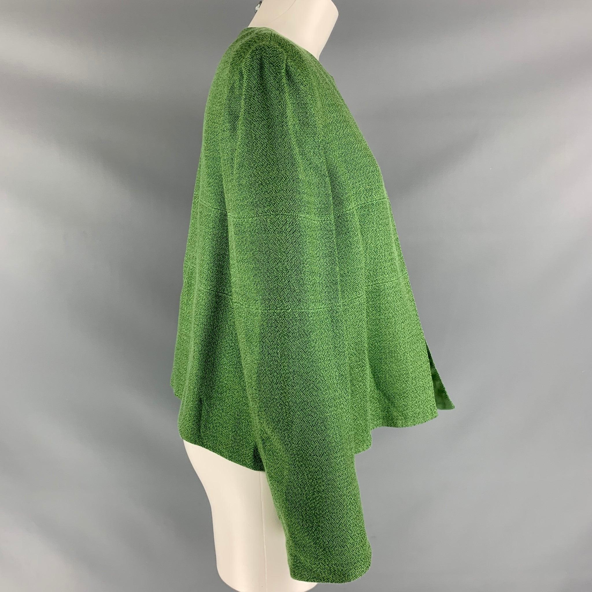 ARMANI COLLEZIONI long sleeve jacket comes in green viscose blend fabric, no collar and boxy silhouette. New with Tag. 
 

 Marked:  12 
 

 Measurements: 
  
 Shoulder: 16.5 inBust: 42 inSleeve: 25 inLength: 24 in
 

  
  
  
 Sui Generis