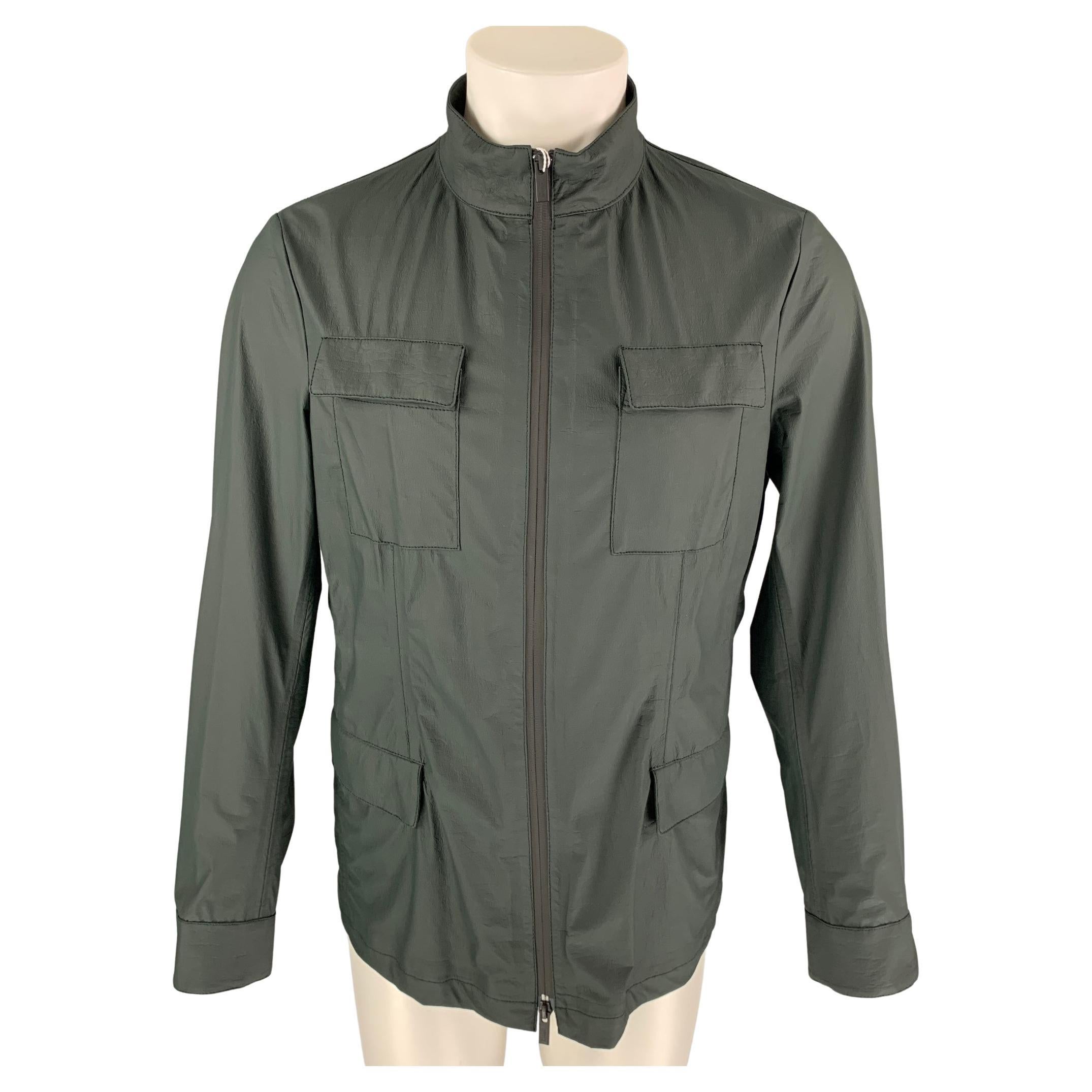 COLLEZIONI Size 38 Dark Green Polyethylene Zip Up Repellent Jacket For Sale 1stDibs