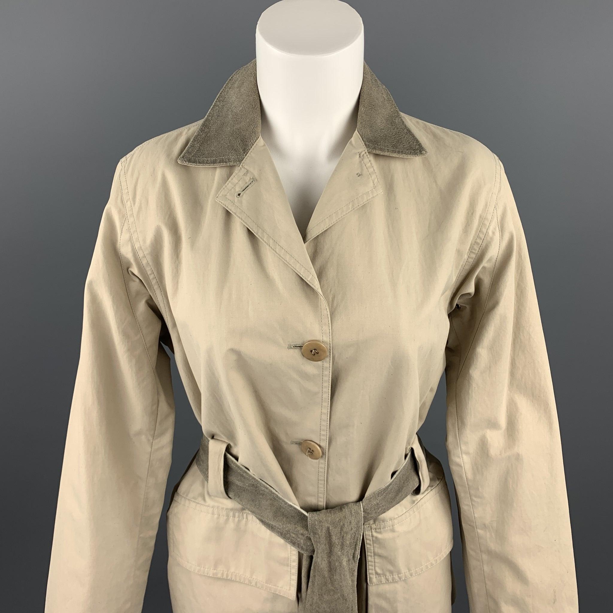 ARMANI COLLEZIONI coat comes in a beige cotton featuring a belted style, suede collar, patch pockets, and a buttoned closure. Wear throughout, and minor stains. As-Is. Made in Italy.Fair
Pre-Owned Condition. 

Marked:  4 

Measurements: 
 
Shoulder: