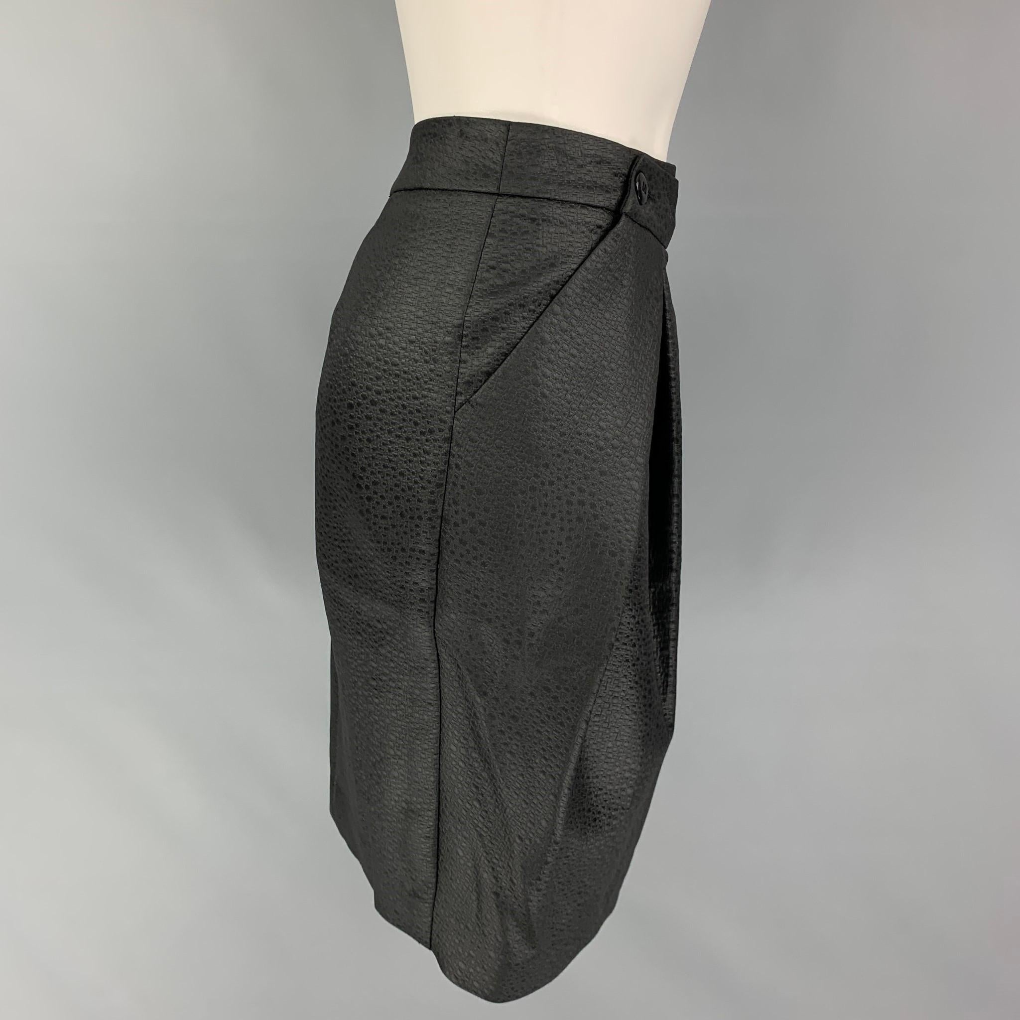 ARMANI COLLEZIONI skirt comes in a black embossed acetate blend featuring a pleated style, slit pockets, and a buttoned closure. Made in Italy.

New with tags. 
Marked: 4

Measurements:

Waist: 28 in.
Hip: 33 in.
Length: 21 in. 