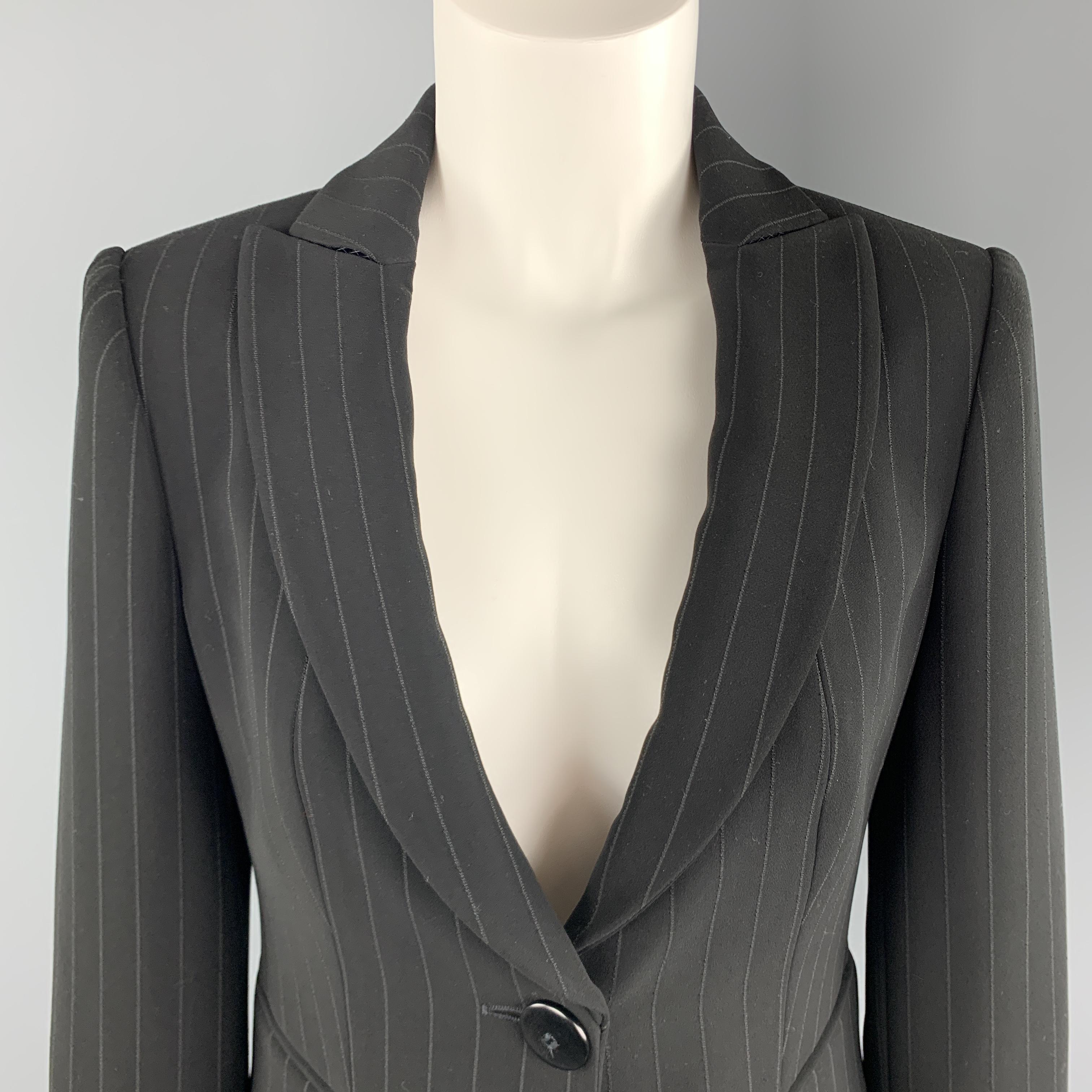 ARMANI COLLEZIONI blazer comes in pinstriped twill with a peak lapel, and single button front. Made in Italy.

Excellent Pre-Owned Condition.
Marked: 4

Measurements:

Shoulder: 15 in.
Bust: 34in.
Sleeve: 24 in.
Length: 24 in.