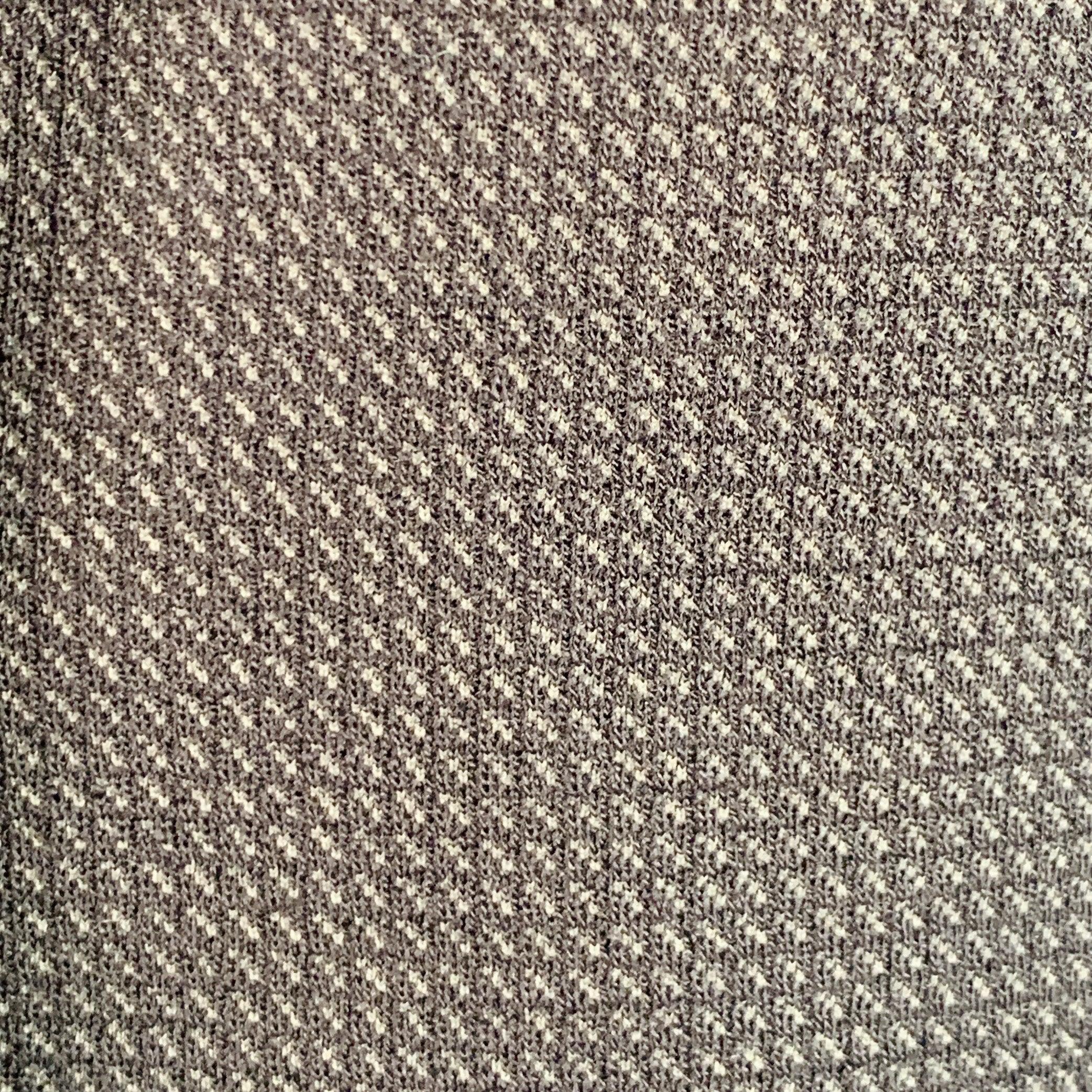ARMANI COLLEZIONI sport coat
in an unlined black and blue wool blend featuring a textured pattern, notch lapel, ventless back, and double button closure. Made in Romania.Very Good Pre-Owned Condition. Minor signs of wear on faux suede elbow patch.