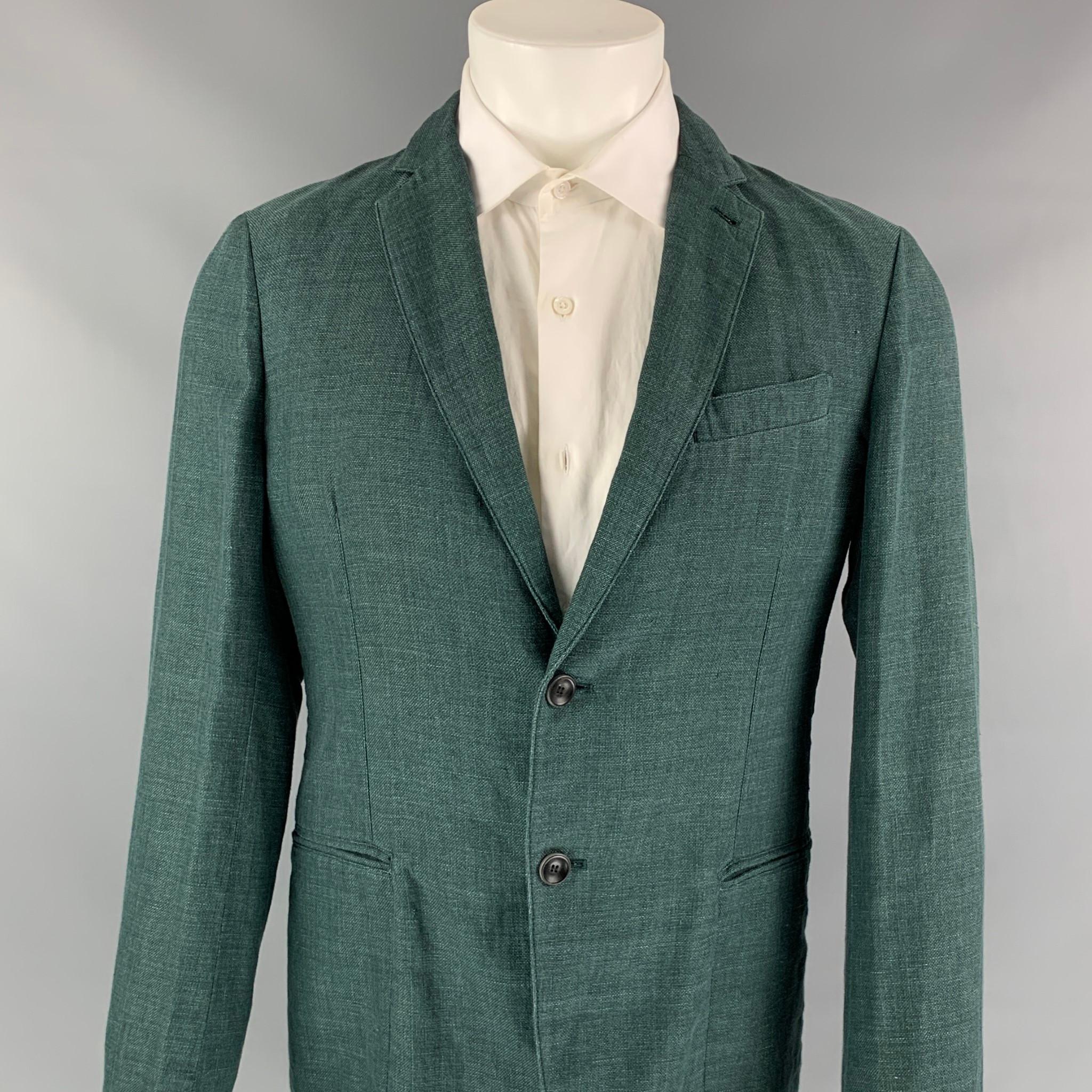 ARMANI COLLEZIONI sport coat comes in a green cotton / linen featuring a notch lapel, slit pockets, and a two button closure. 

New With Tags. 
Marked: 50

Measurements:

Shoulder: 16.5 in.
Chest: 40 in.
Sleeve: 26 in.
Length: 28 in. 