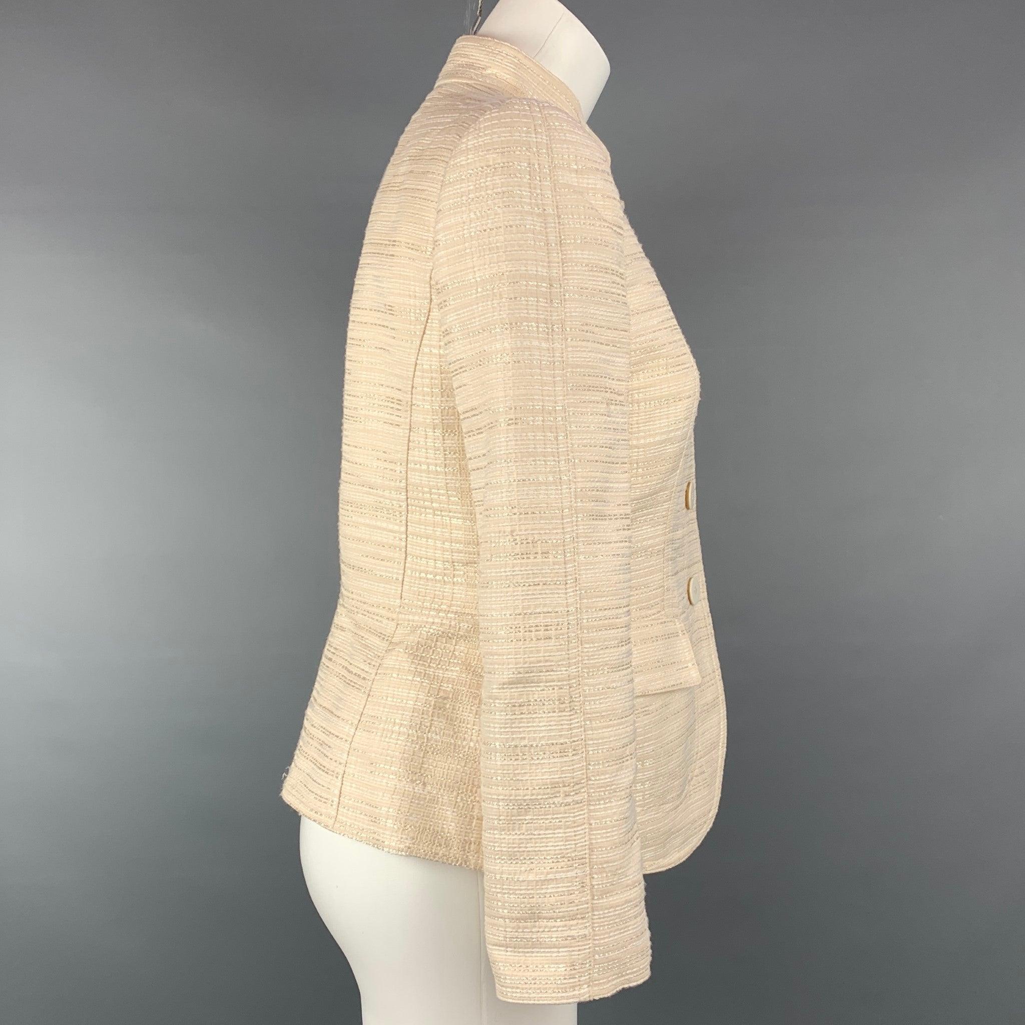 ARMANI COLLEZIONI jacket comes in a cream seersucker silk / viscose with a full liner featuring a nehru collar, flap pockets, and a buttoned closure. Made in Italy.Very Good
Pre-Owned Condition. 

Marked:   6 

Measurements: 
 
Shoulder:
15 inches 