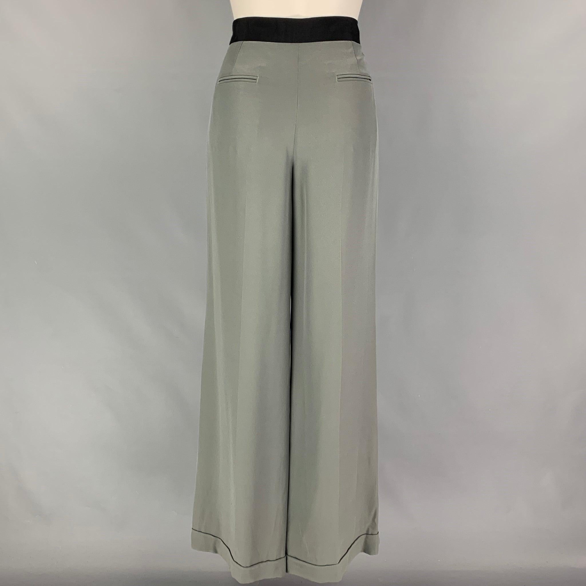ARMANI COLLEZIONI pants comes in a grey acetate / silk featuring a ribbon waist trim, pleated, wide leg, cuffed front tab, and a zip fly closure. Made in Italy.
New with tags. 

Marked:  6 

Measurements: 
 Waist: 32 inches Rise: 11.5 inches Inseam: