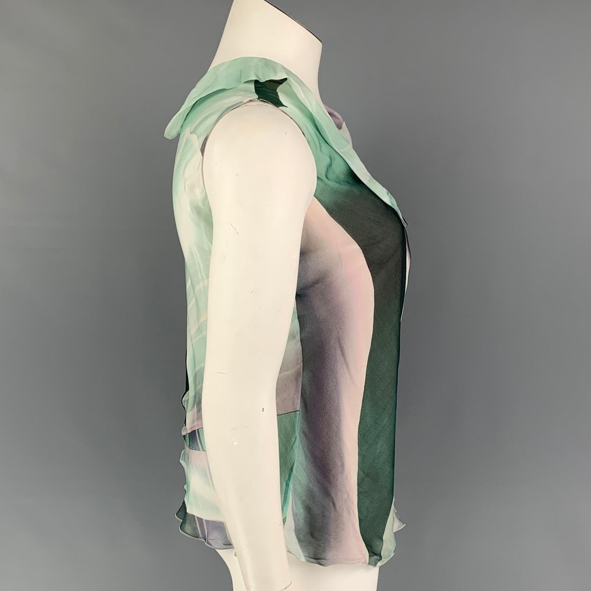 ARMANI COLLEZIONI top comes in a green & purple marbled silk featuring a ruffled hem, sleeveless, and a deep neckline. Made in Italy.
 Very Good
 Pre-Owned Condition. 
 

 Marked:  8 
 

 Measurements: 
  
 Shoulder: 15 inches Bust: 34 inches