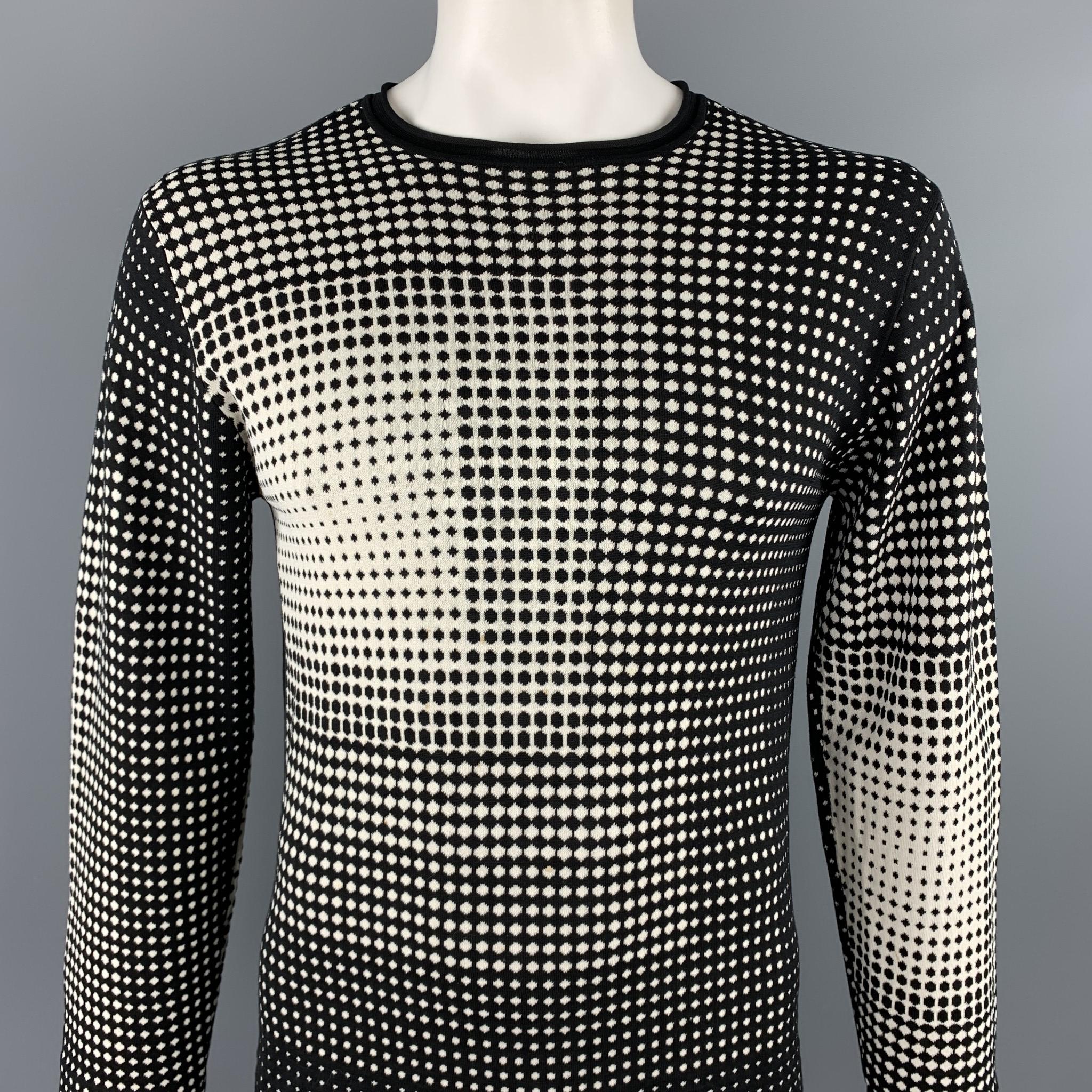 ARMANI COLLEZIONI pullover comes in a black & white geometric silk blend featuring a crew-neck.

Excellent Pre-Owned Condition.
Marked: L

Measurements:

Shoulder: 20 in. 
Chest: 40 in. 
Sleeve: 25.5 in. 
Length: 27 in. 