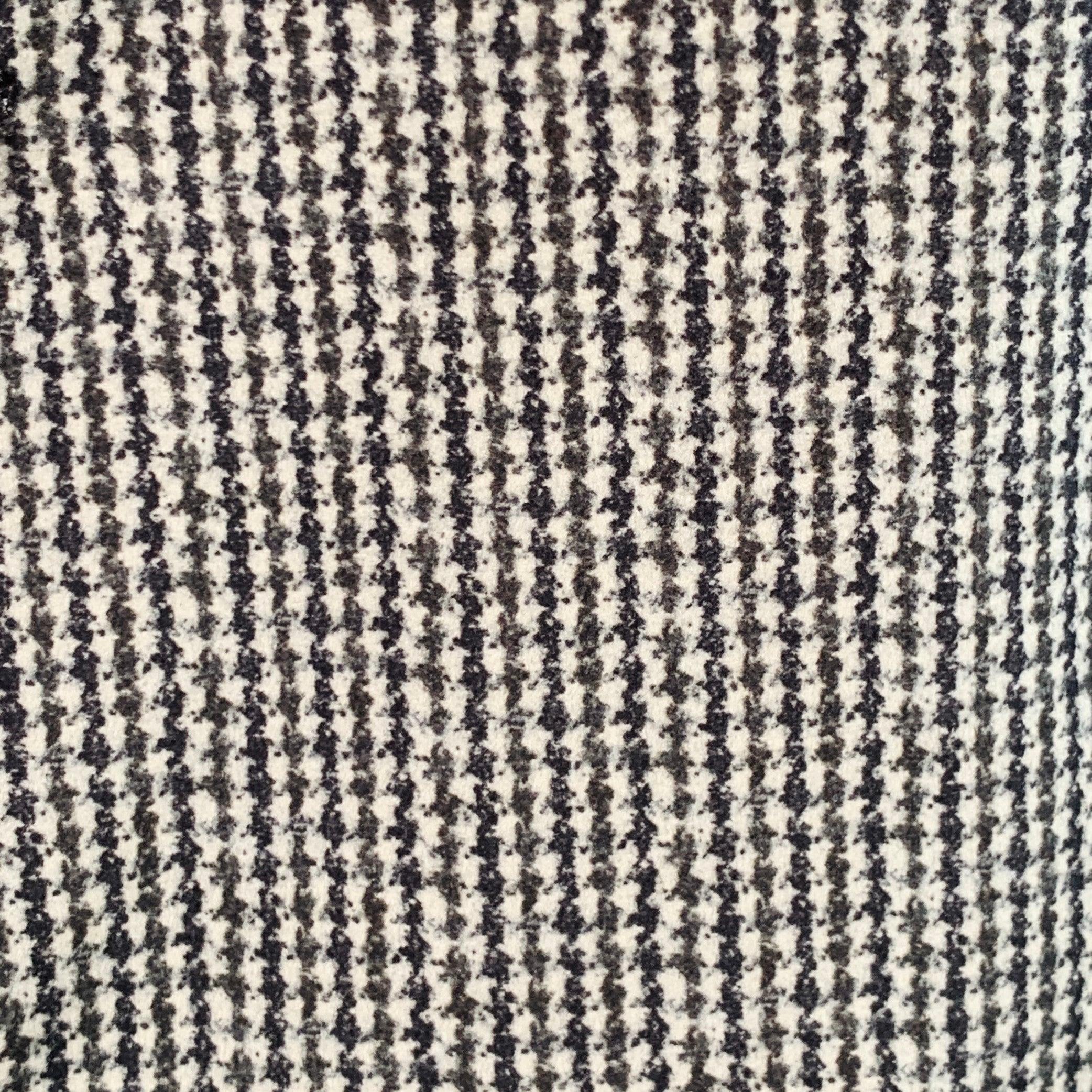 ARMANI COLLEZIONI sport coat
in a black and cream polyester velvet featuring a houndstooth pattern, notch lapel, double vented back, and double button closure. Excellent Pre-Owned Condition. 

Marked:   size not marked 

Measurements: 
 
Shoulder: