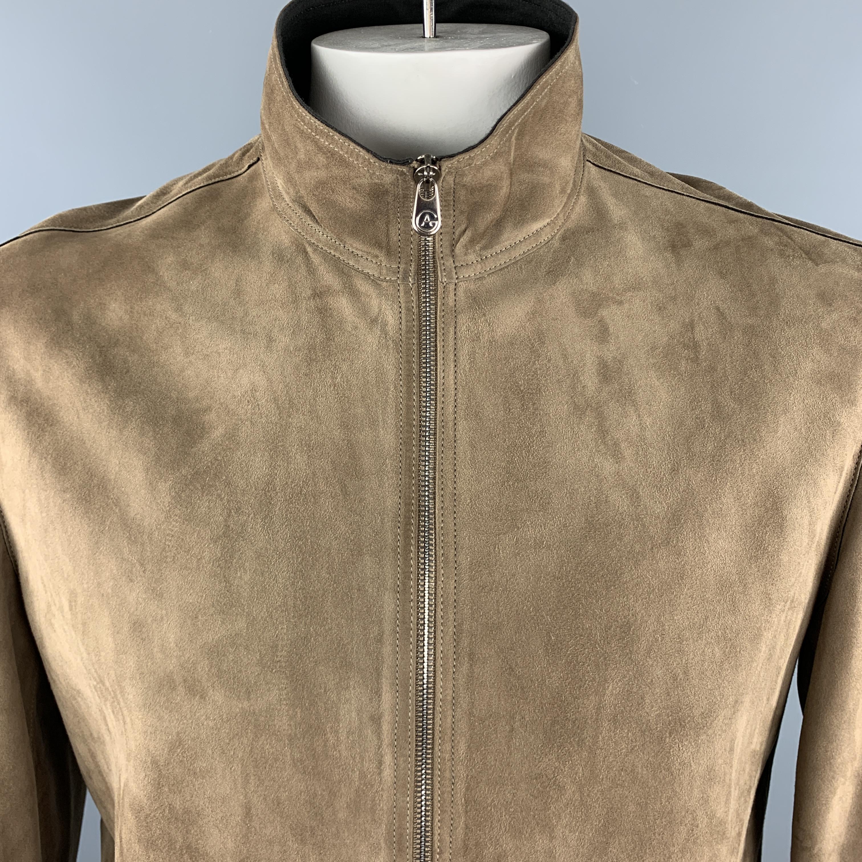 ARMANI COLLEZIONI Motorcycle Jacket comes in a brown tone in a solid suede material, with a high collar, zip pockets, unbuttoned cuffs, unlined, zip up. Made in Italy. 

Excellent Pre-Owned Condition.
Marked: IT 42

Measurements:

Shoulder: 18.5 in.