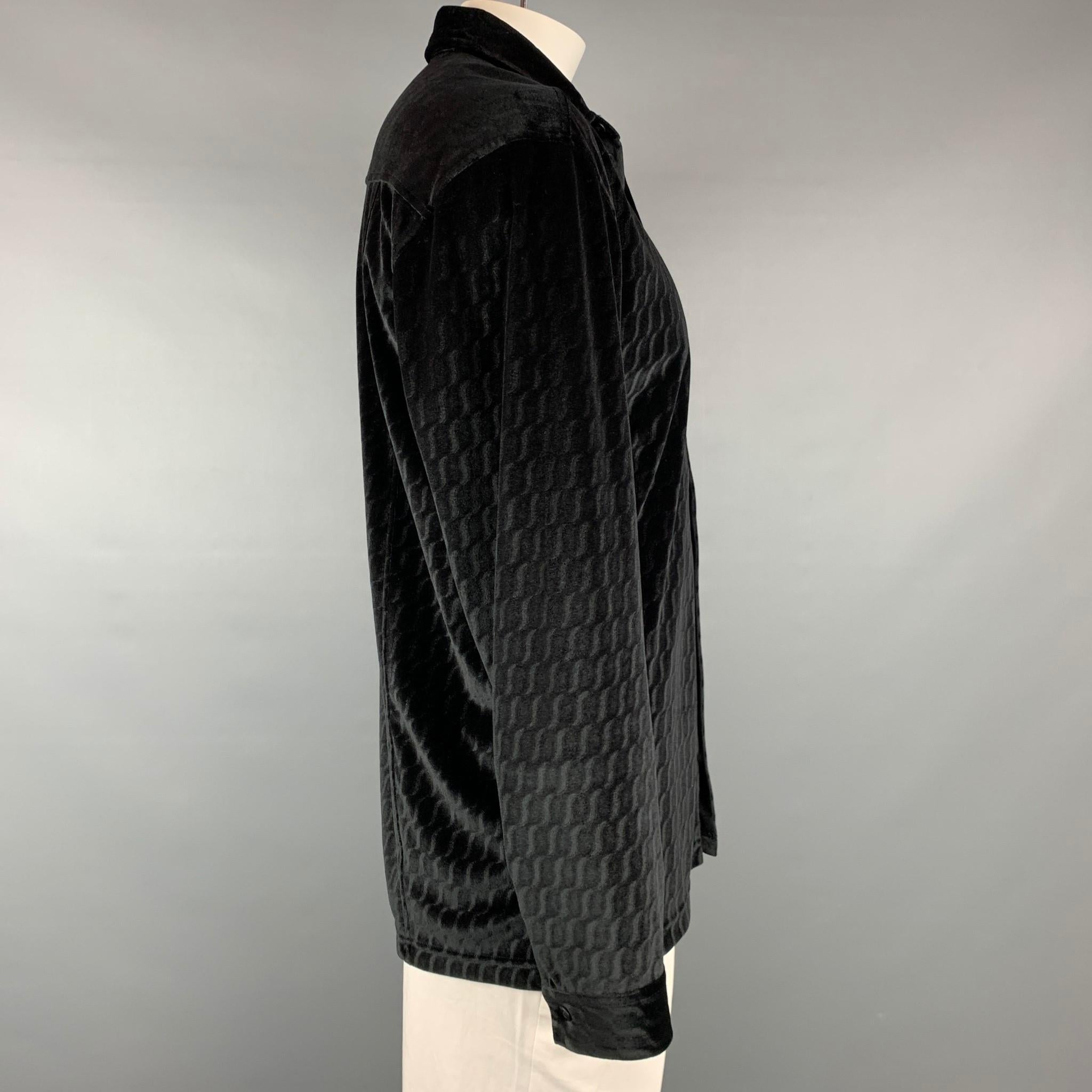 ARMANI COLLEZIONI long sleeve shirt comes in a black swirl print velvet featuring a button up style and a pointed collar. 

New With Tags.
Marked: XL

Measurements:

Shoulder: 22 in.
Chest: 44 in.
Sleeve: 26.5 in.
Length: 30.5 in. 