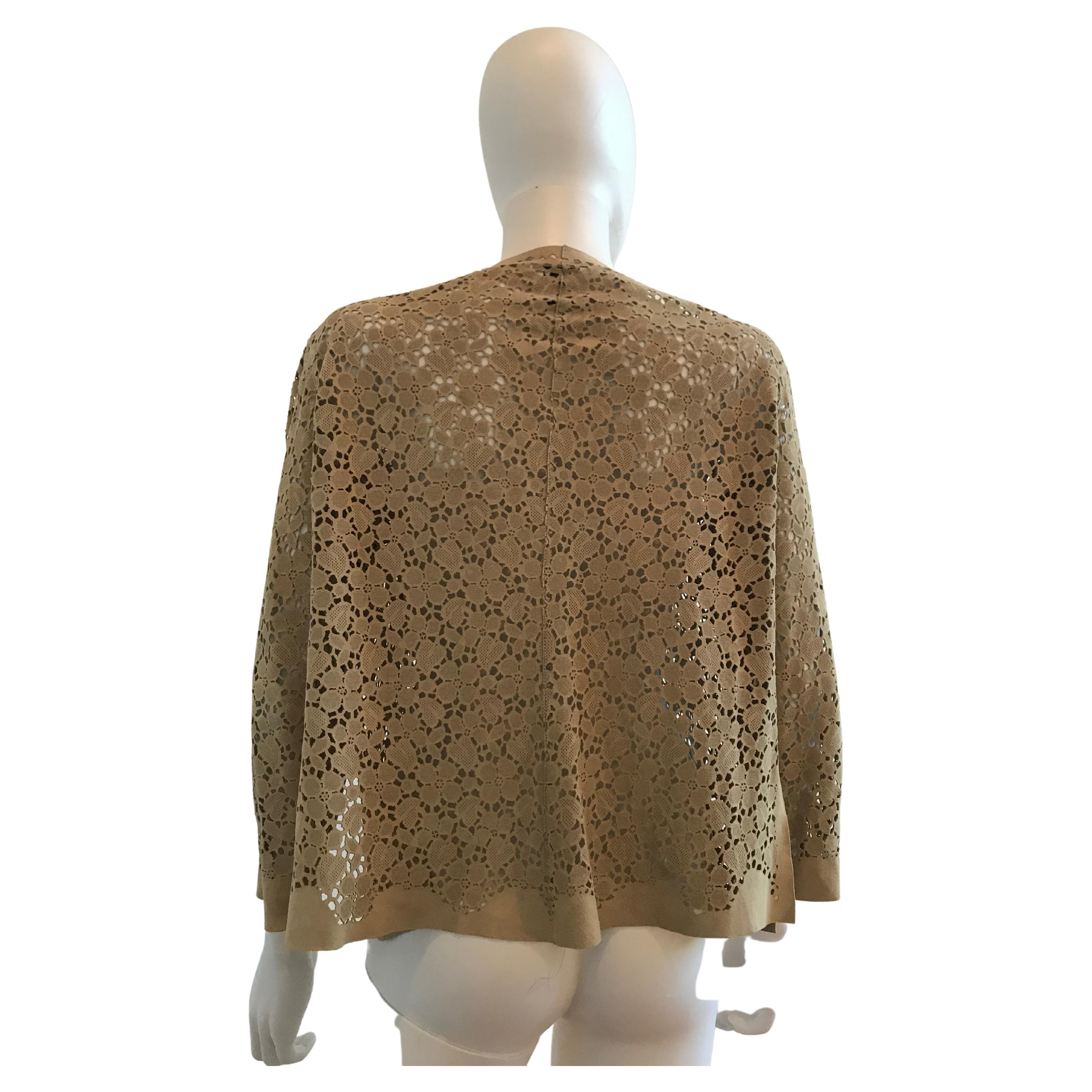 Armani Collezioni Suede Laser Cut Cardigan
Made in Italy
Size 8
Please be mindful that this piece has led a previous life, and may tell its story through minor imperfection. Purchasing this item continues its narrative, so you can be confident that