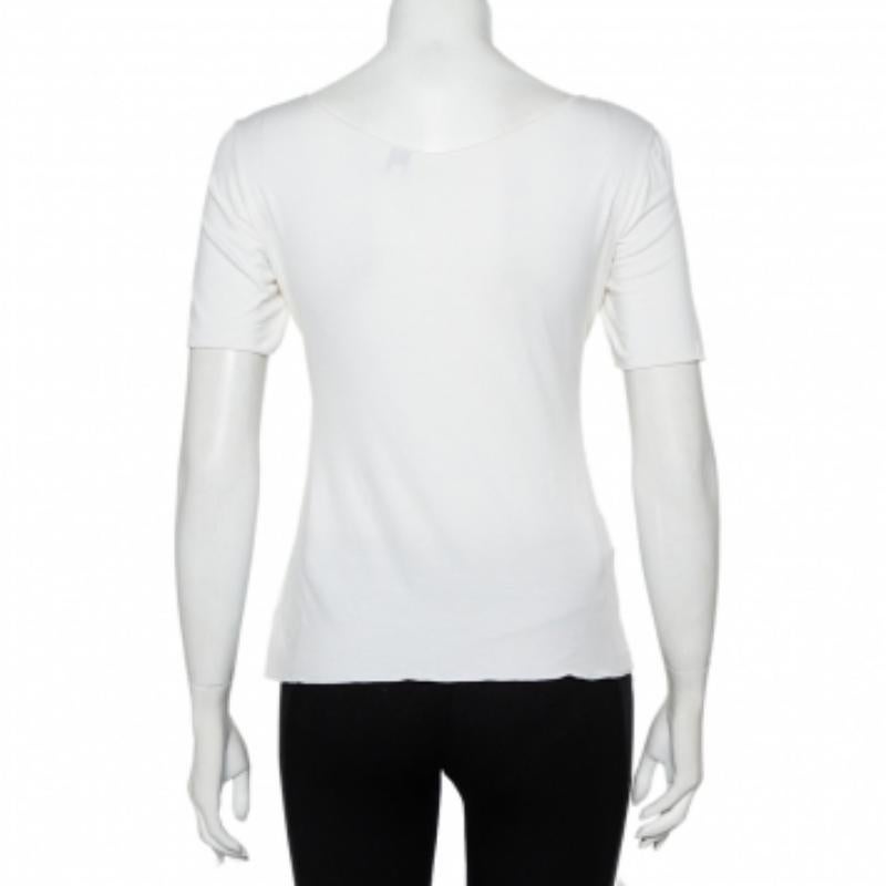 Armani Collezioni brings to you this unique top that can be paired with almost anything in your dresser. This white top features a draped neckline. Made from fine quality fabrics, this top gives you a touch of elegance.