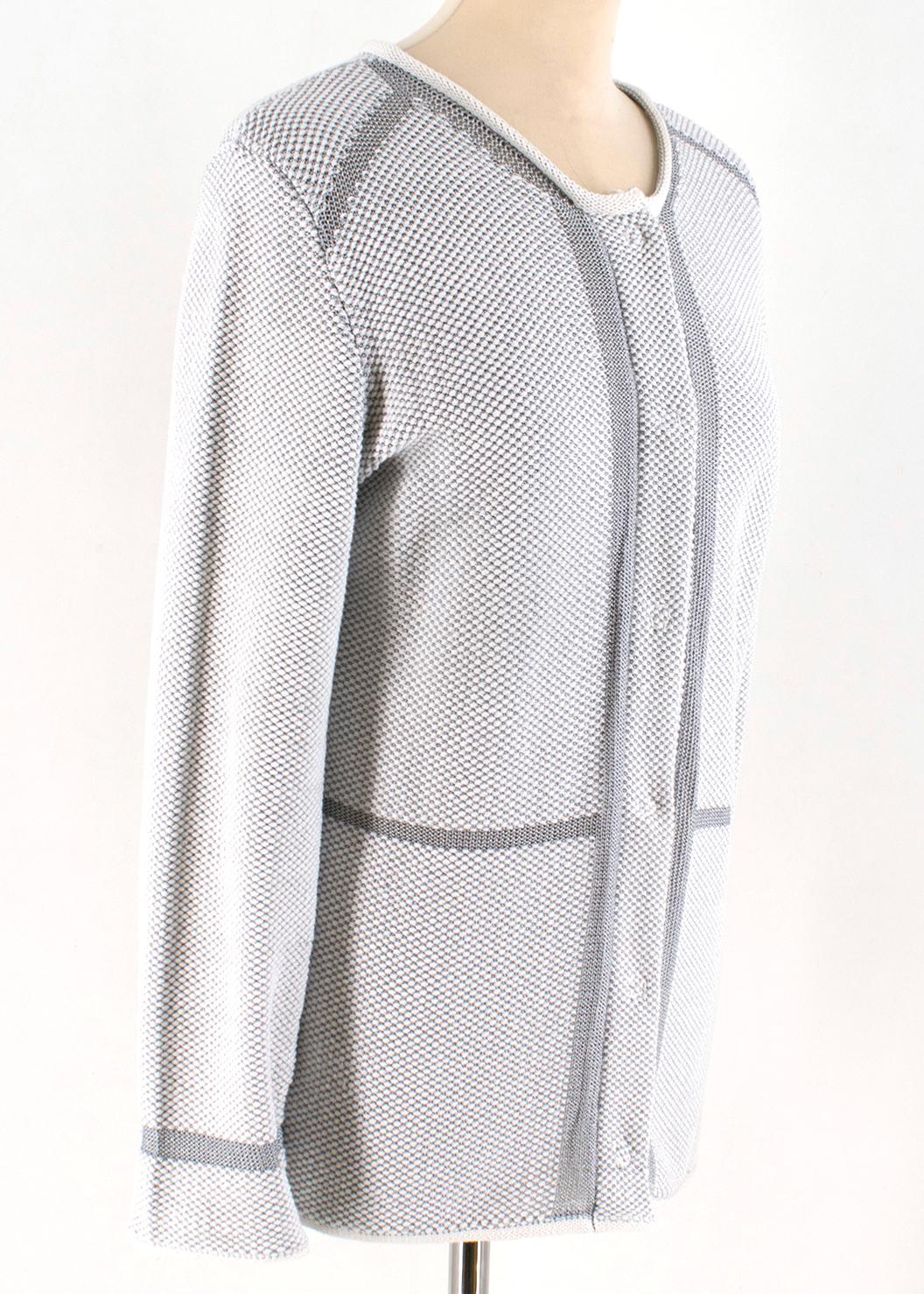 Armani Collezioni Woven Tweed Cardigan

- Finely Woven Cardigan, excellent for warmth and stylish
- Excellent, secure button fastening. As well as hidden buttons when fastened. 
- Woven tweed
- White lining at collar & cuffs
- Extremely soft fabric