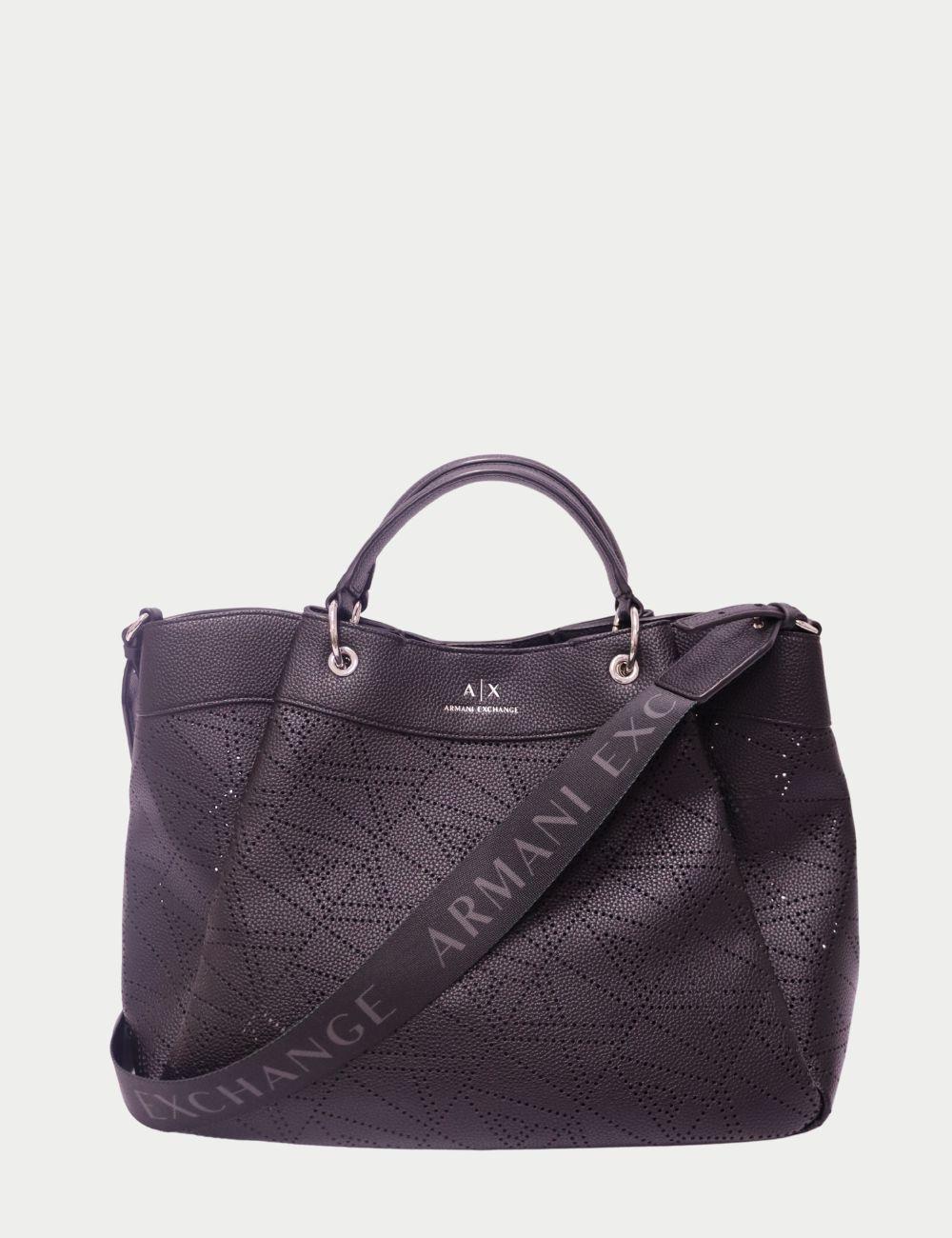 Bolsa Tote Armani Negra Cortada a Láser con Correa con Logotipo

Moderno, elegante y versátil sin esfuerzo: el Bolso Tote Negro Armani se ha diseñado pensando en el minimalismo contemporáneo. Este bolso, fabricado en piel sintética de alta calidad