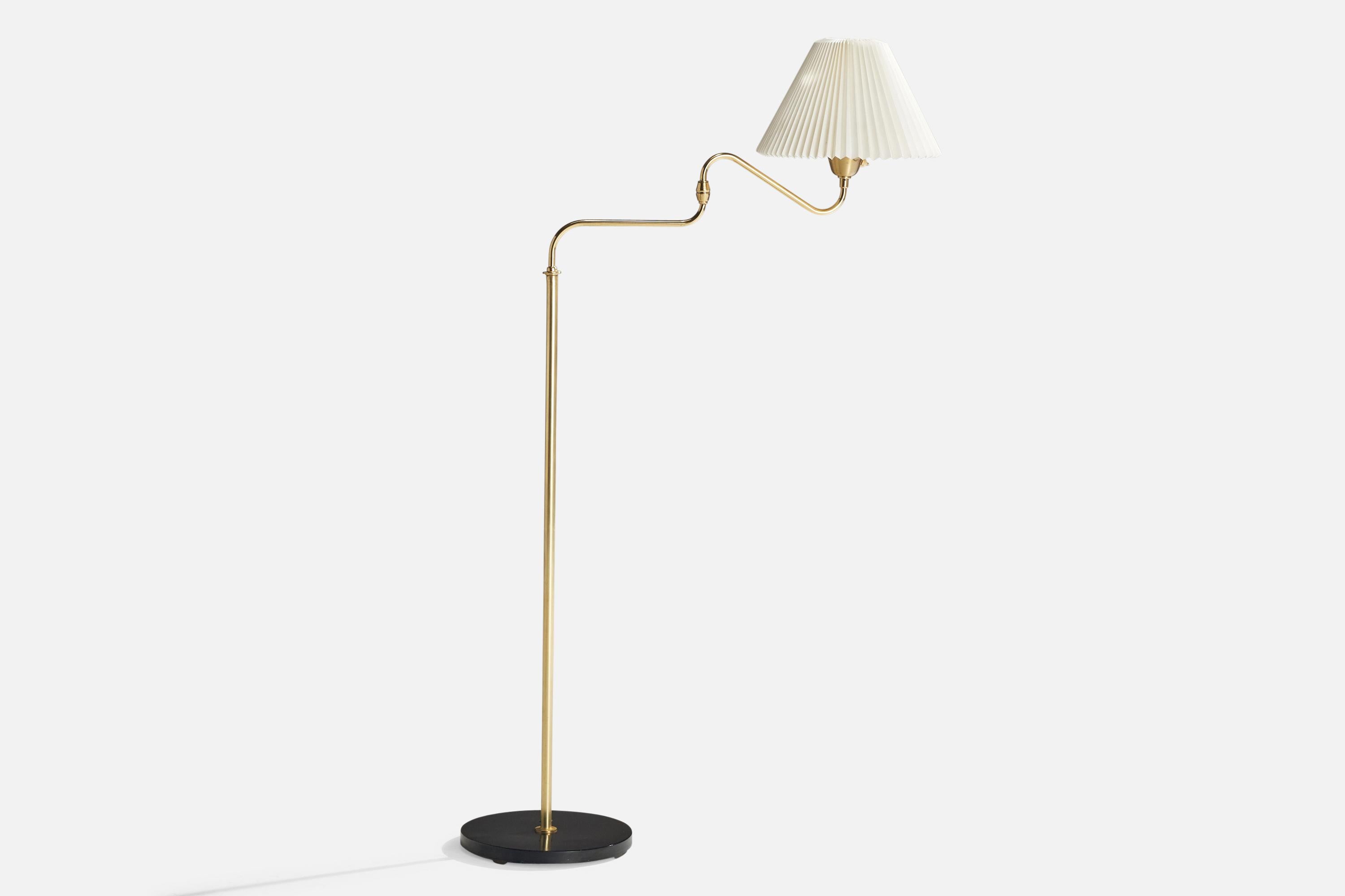 An adjustable brass, black-lacquered wood and white paper floor lamp produced by AB Armaturhantverk Göteborg, Sweden, c. 1960s.

Dimensions of Lamp with Shade (inches): 53.75“ H x 16.25” W x 32” D

Width and depth varies depending on