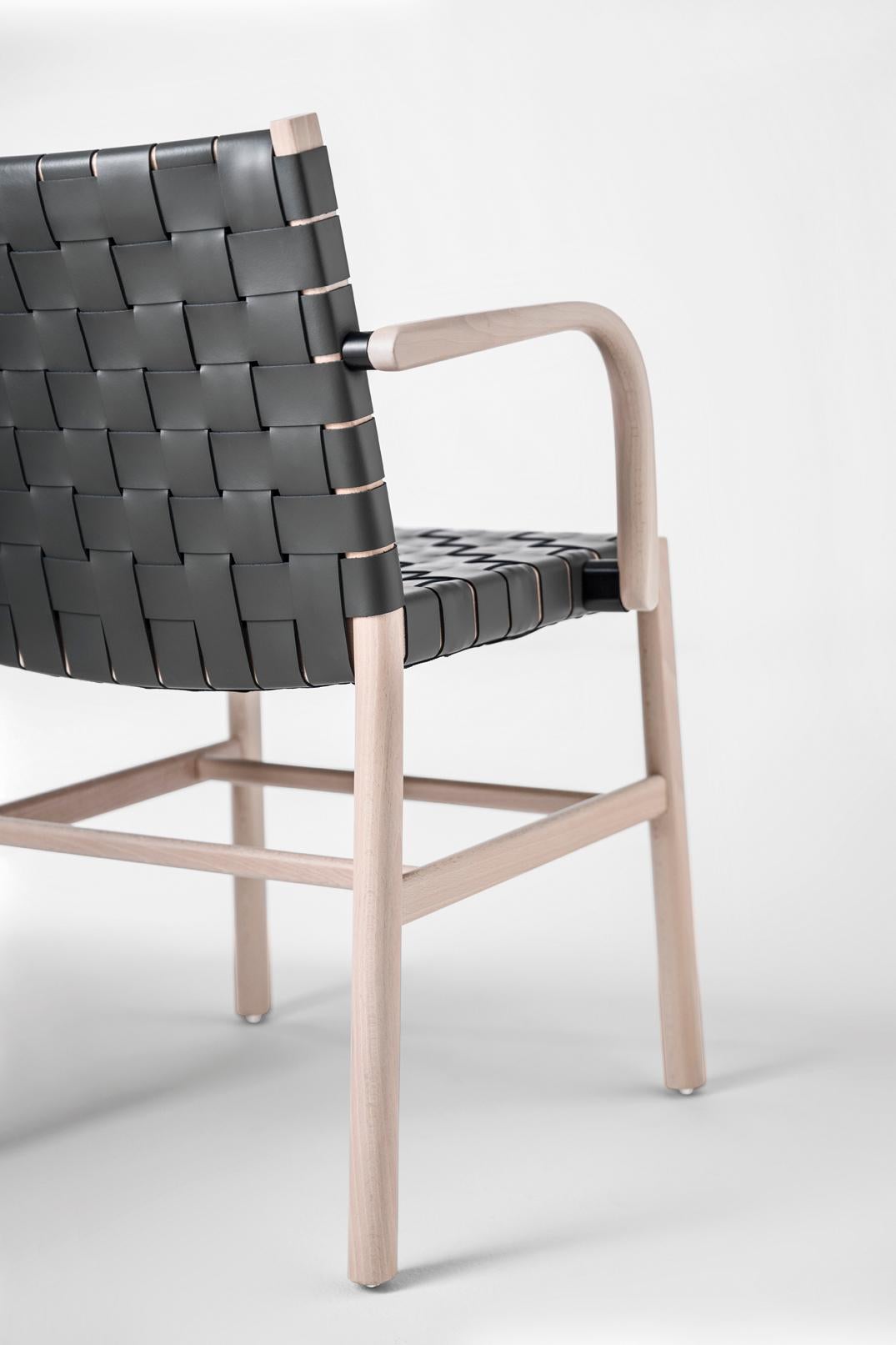 Julie Collection expands to include a new model featuring a backrest and seat with a interwoven thick leather. The frame in beechwood will be painted or lacquered in different colors , the thick leather available in 20 colors. Ideal for contract
