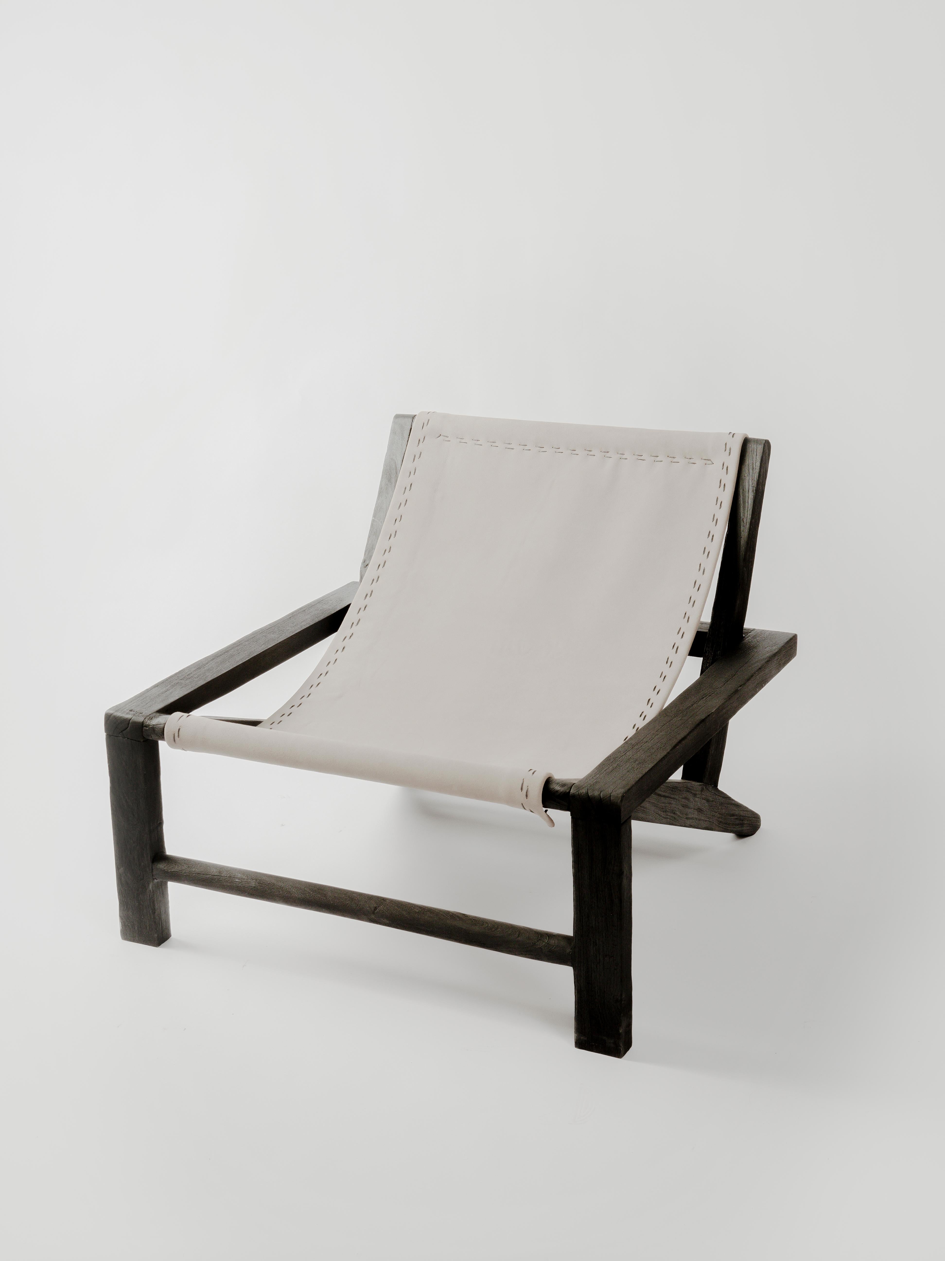 Armchair 02 by Daniel Orozco
Material: Burned wood armchair with gray leather seat.
Dimensions: D 75 X W 62  X H 62 cm

Burned wood armchair with gray leather seat. Handmade by Mexican artisans.

Daniel Orozco Estudio
We are an inclusive interior