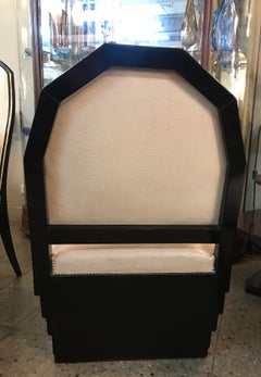 Armchair and stool in leather and wood in Art Deco style, 1930