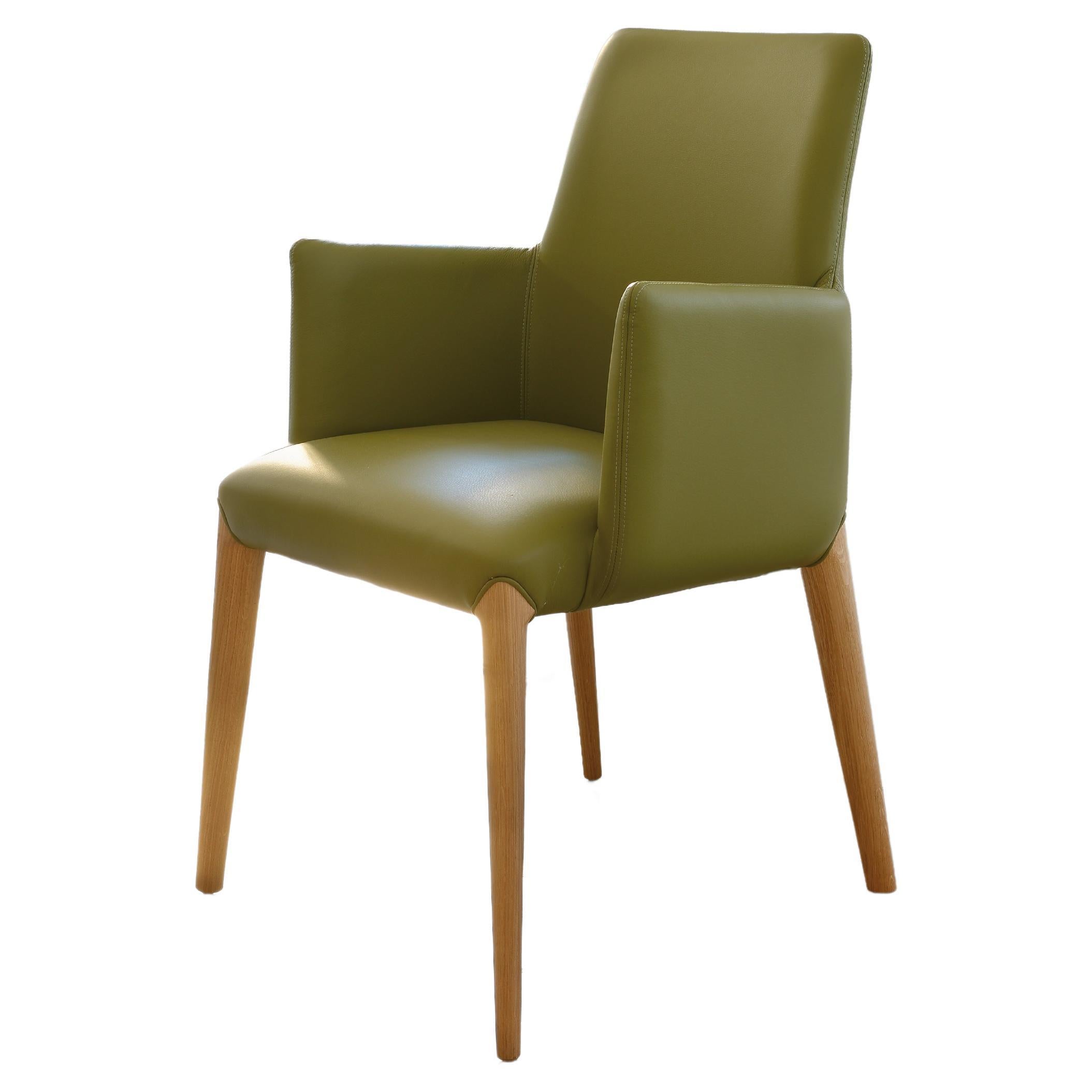 armchair art. Ines in green leather for living room or restaurant, confortable  For Sale
