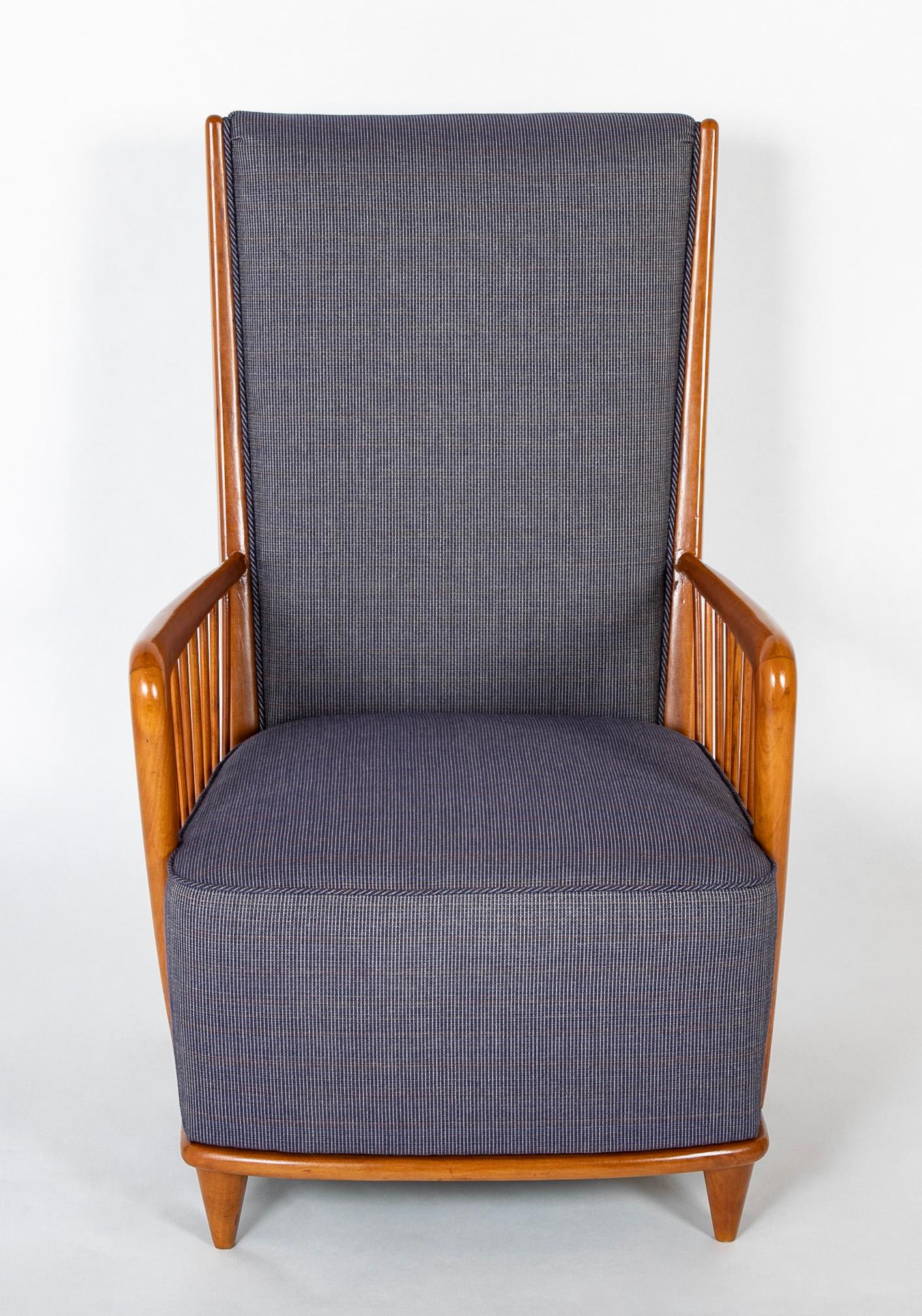 Italian upholstered armchair attributed to Paolo Buffa ( 1903 - 1970 ) having open vertical dowels in the arms.   
