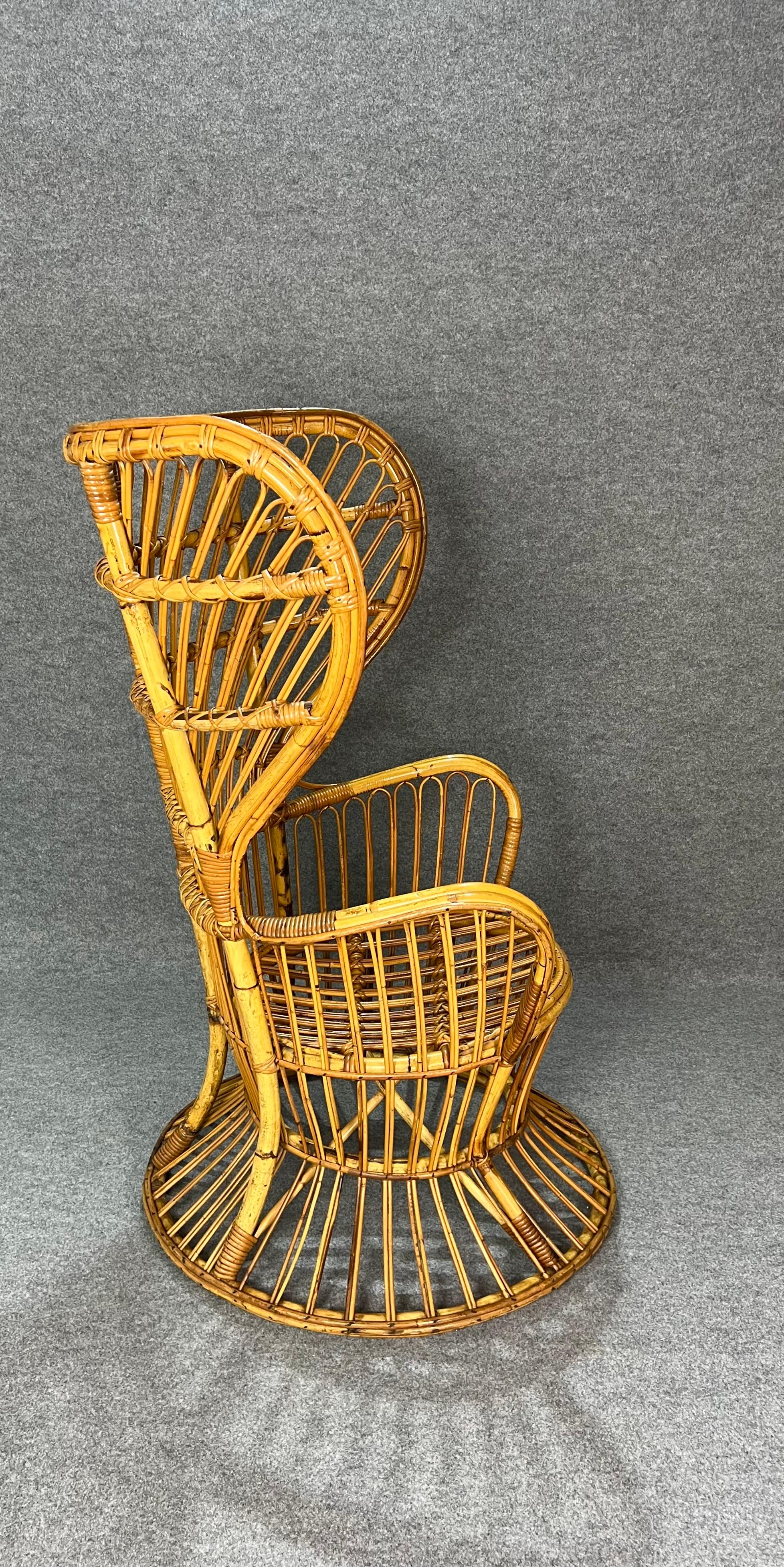 Armchair designed in the style of Lio Carminati and Gio Ponti and produced in Italy in the 1950s.
The armchair with high backrest and curvilinear shapes was made of bamboo and rattan/wicker.


Note: We try to offer our customers an excellent service