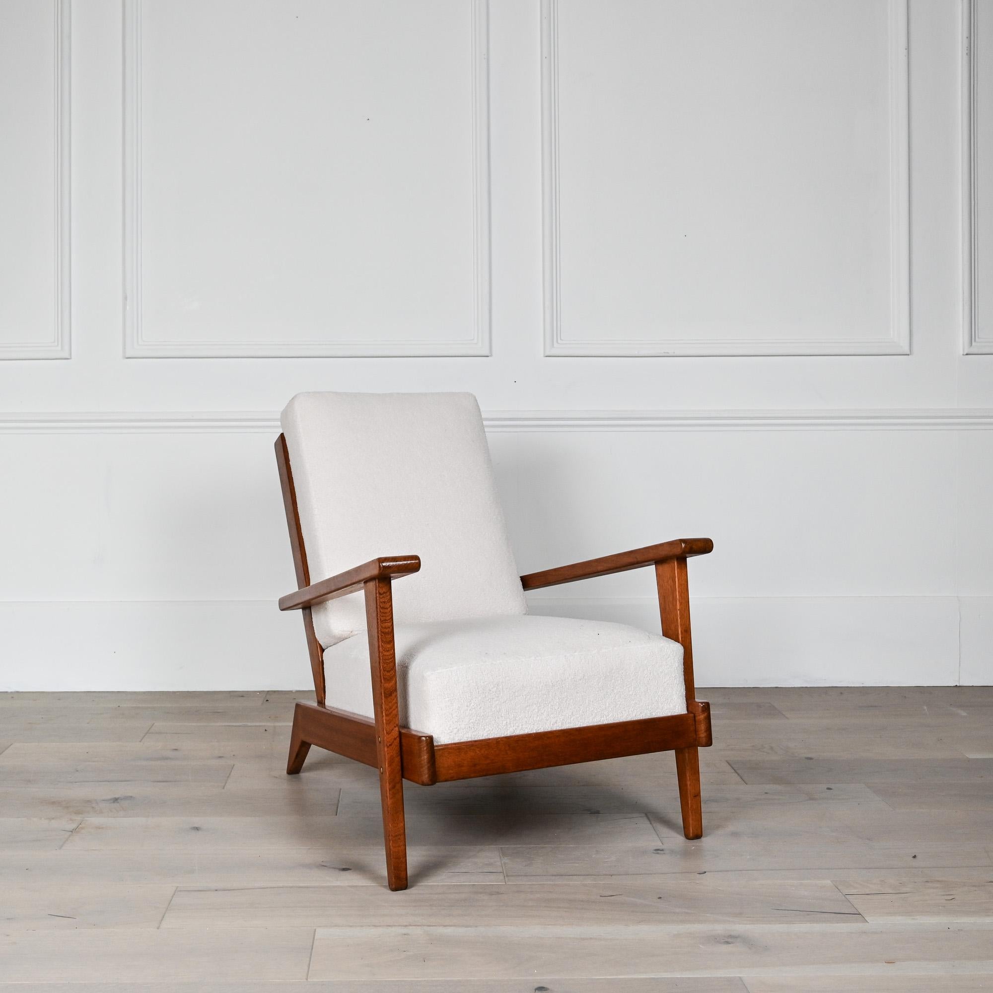 1950s armchair by French designer André Sornay.
Timber frame with upholstered drop in seat and drop in back cushion.
Good vintage condition for this rare sought after armchair.

André Sornay created furniture with resolutely modern lines. Influenced
