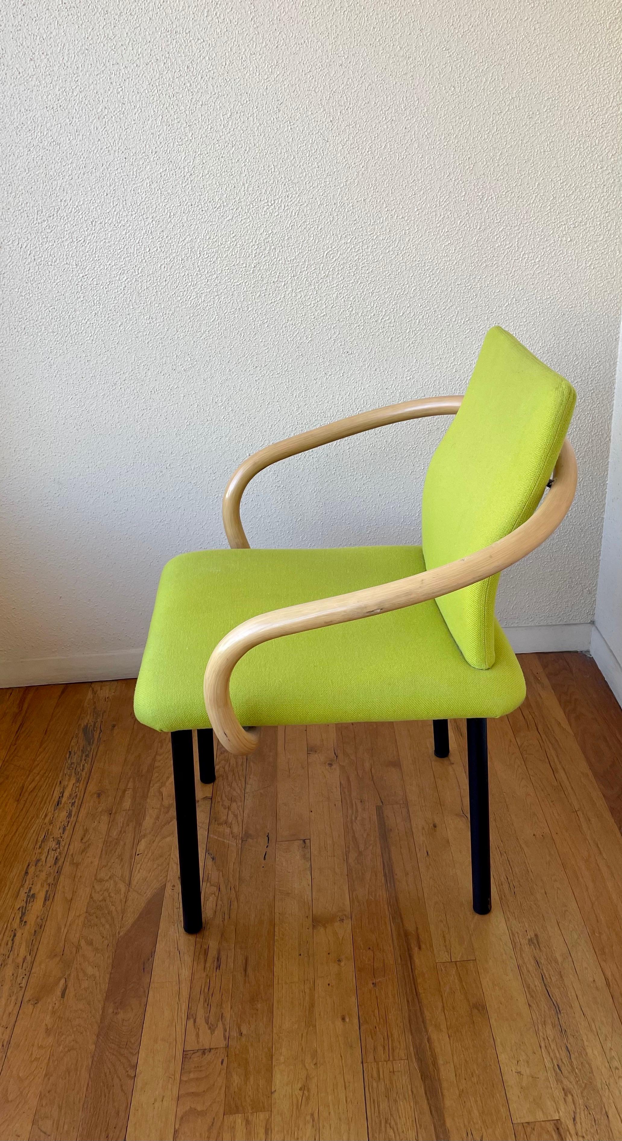 Rare Mandarin chair designed by Sottsass for Knoll, in lime green fabric on foam black enameled tubular legs and rattan pipping arms, simple and elegant by this master architect. A very rare color to find fabric it's in great condition. Classic