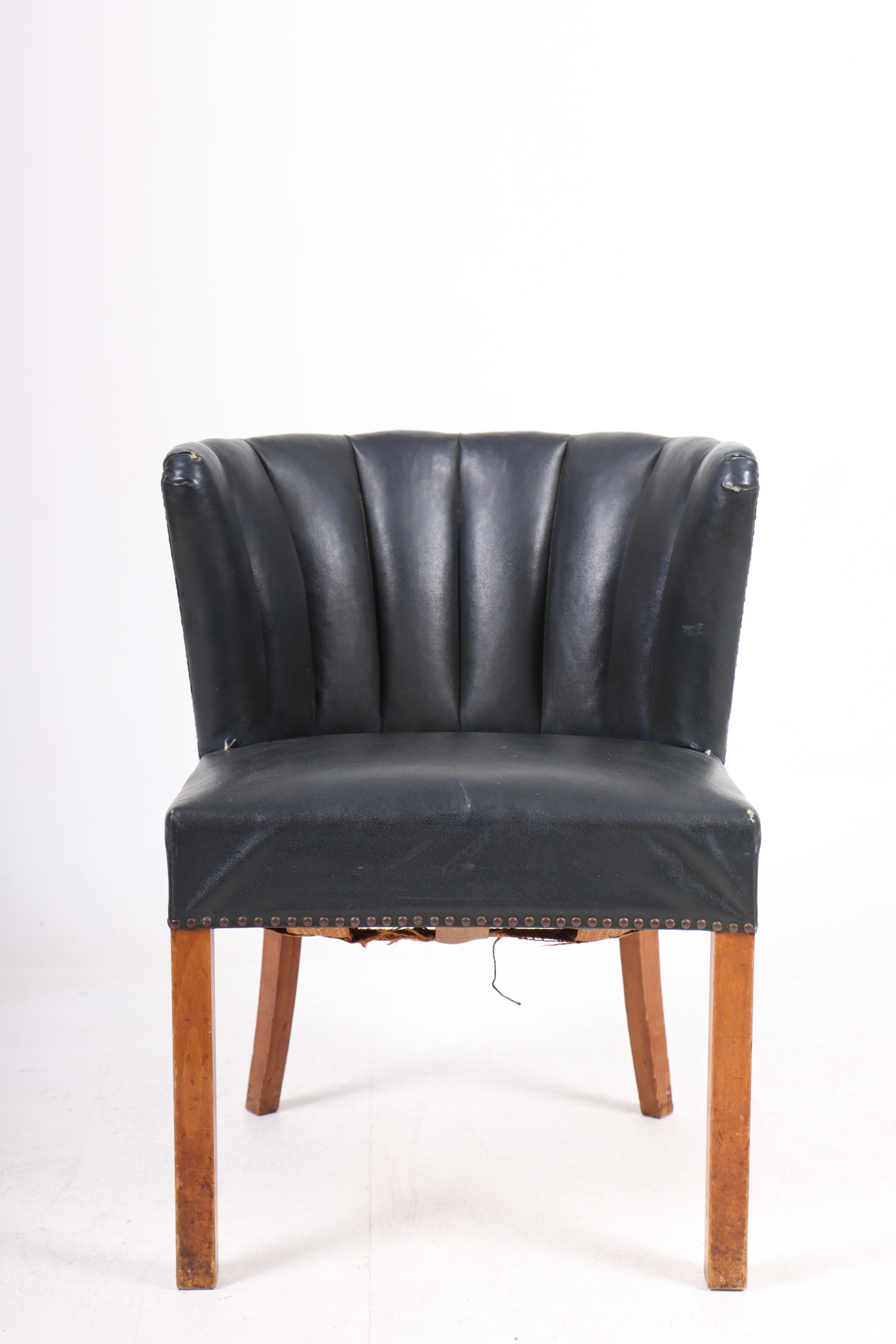 Armchair in faux leather designed and made by Fritz Hansen in 1940s. Original condition.