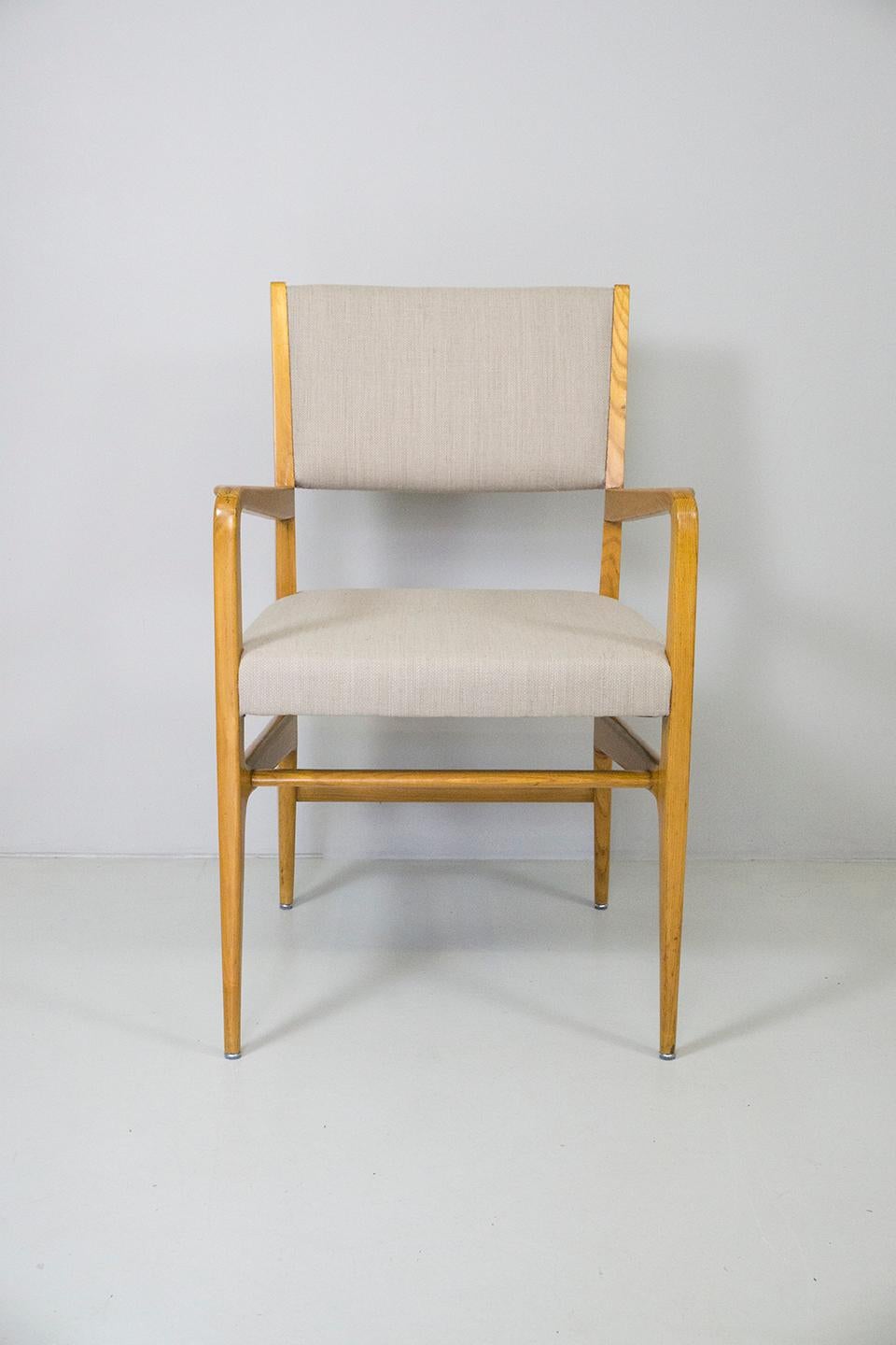 This armchair, designed by Gio Ponti, is made out of solid oak, beige cover and cushion renewed 
Dimension: H 88 cm, W 53 cm, D 52 cm, SH 48 cm 
Design Gio Ponti, 1950.
Manufacturer by Cassina.