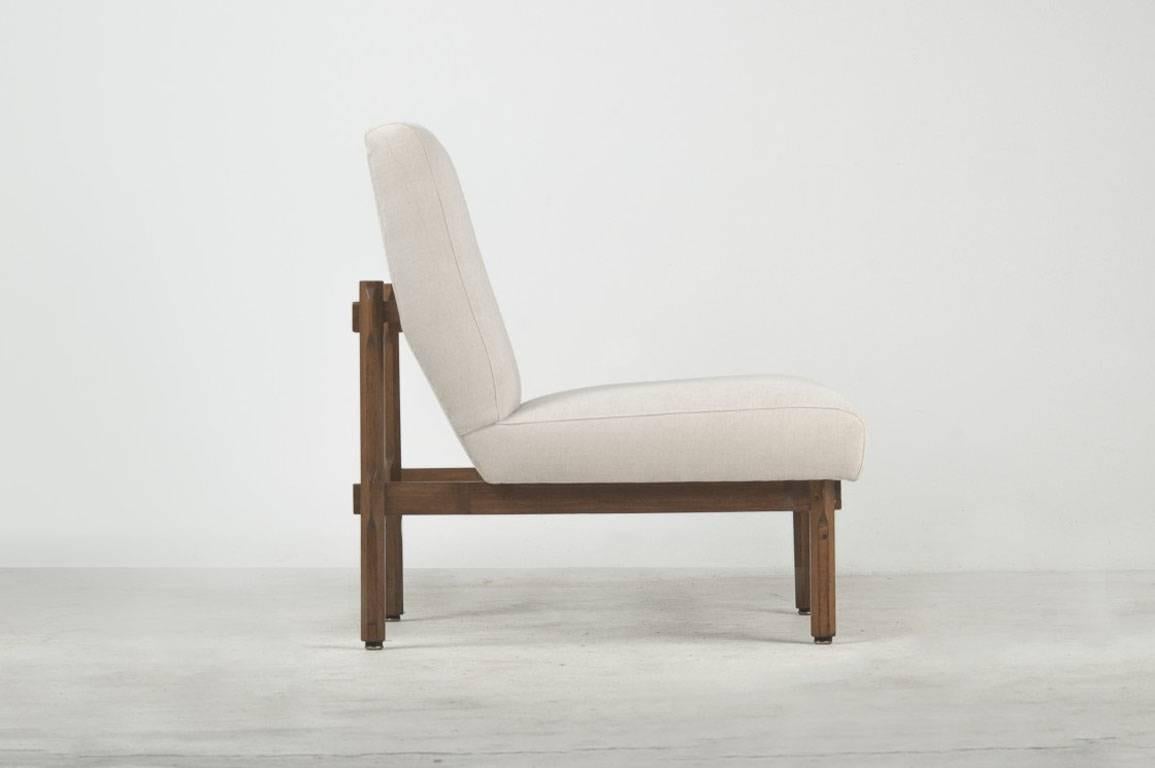 Ico Parisi (1916–1996)

Armchair
That piece is part of a set composed by a three seats sofa, a two seats sofa , a single armchair and an ottoman.
Manufactured by Figli de Amadeo de Cassina
Italy, 1960
Walnut wood and upholstery

Measurements
81 cm x