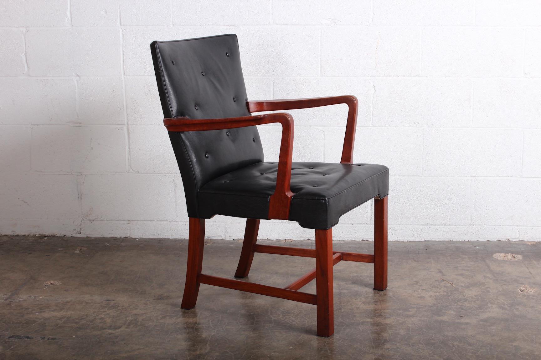 A teak and leather armchair or desk chair by Jacob Kjær.