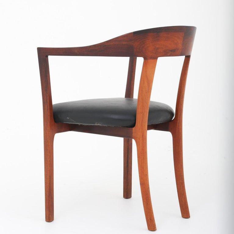Ole Wanscher / A J Iversen. Rare armchair in rosewood and black leather. Model J2833. Designed in 1958.