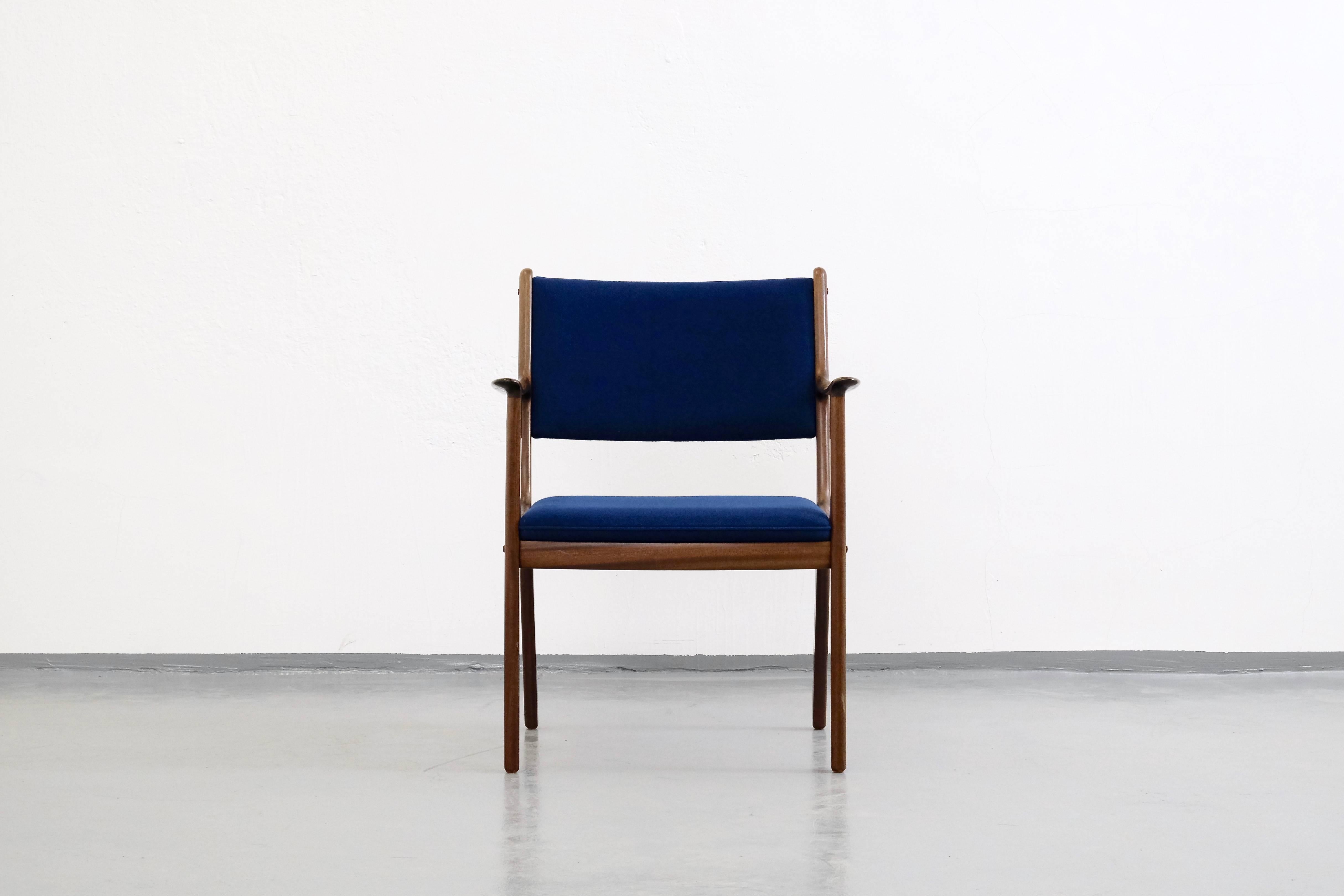 Lovely armchair in mahogany and original blue wool upholstery. Designed by Ole Wanscher and manufactured by P. Jeppesens Møbelfabrik, Denmark, 1960s.

 