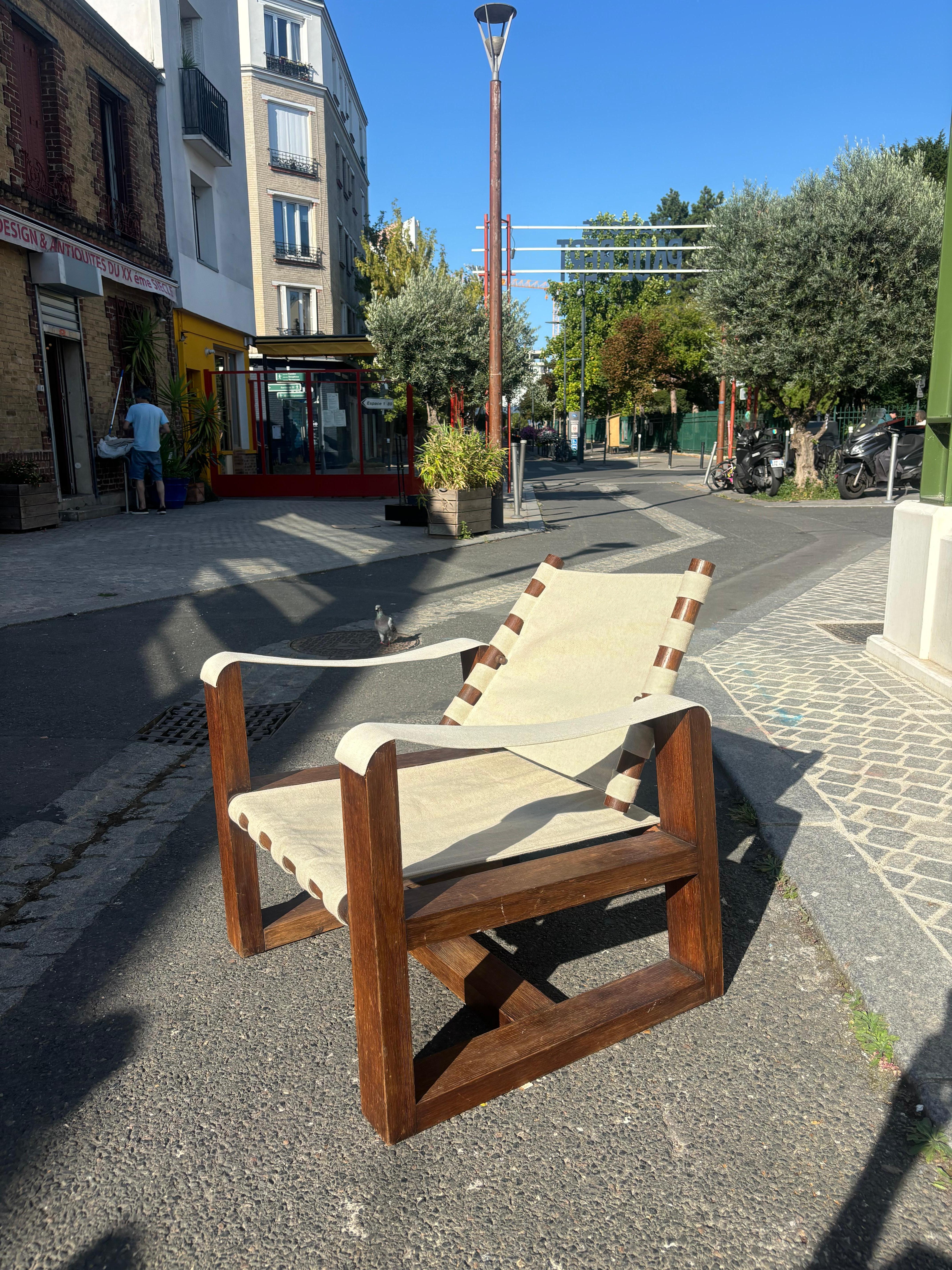 Fauteuil, 1930-1925 en chêne et tissu attribué à Eure De Lanux, 
Très belle qualité d’ouvrage et de dessin