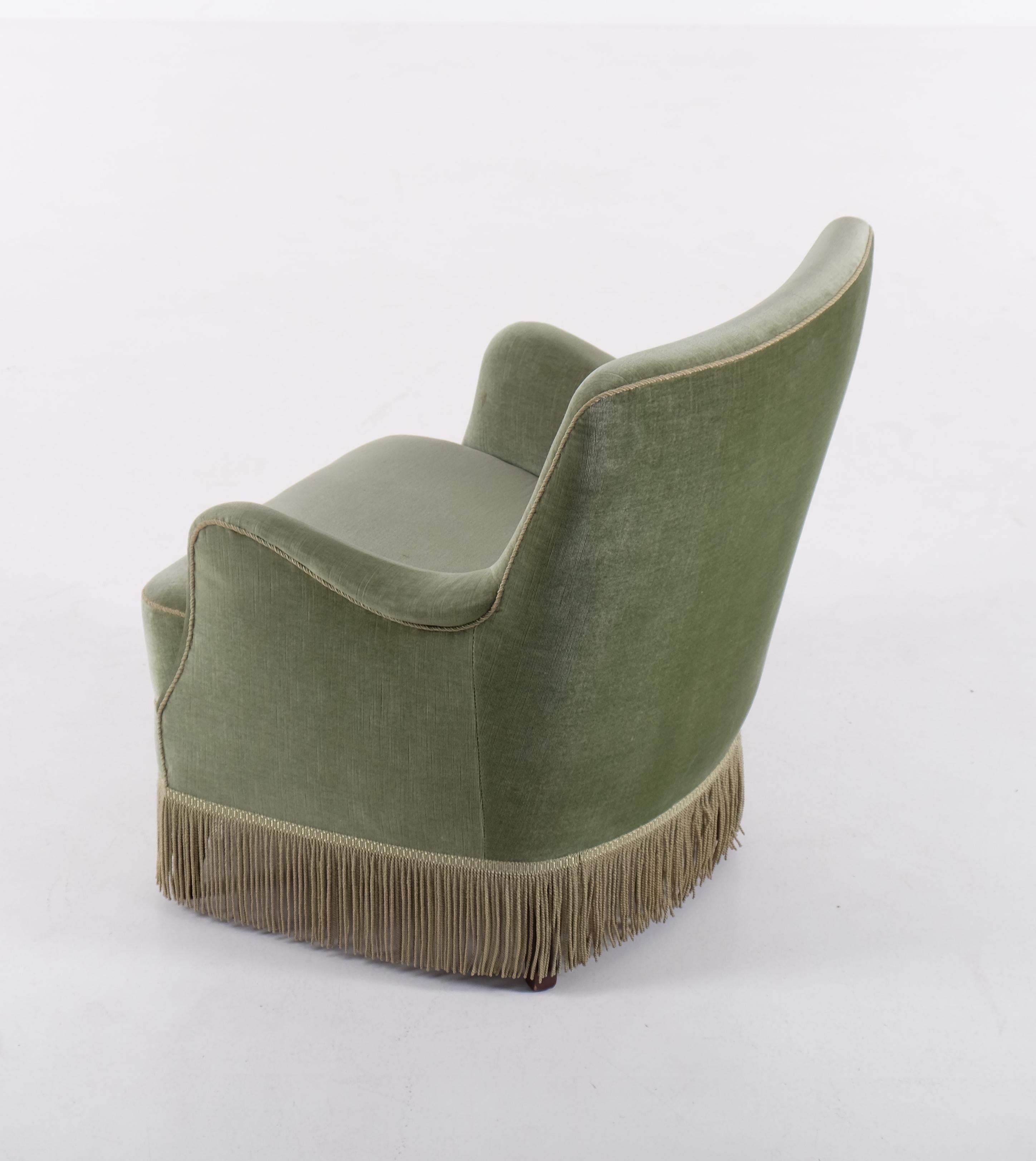Armchair, produced in Denmark, 1960s. Beech legs and velvet fabric + skirt.