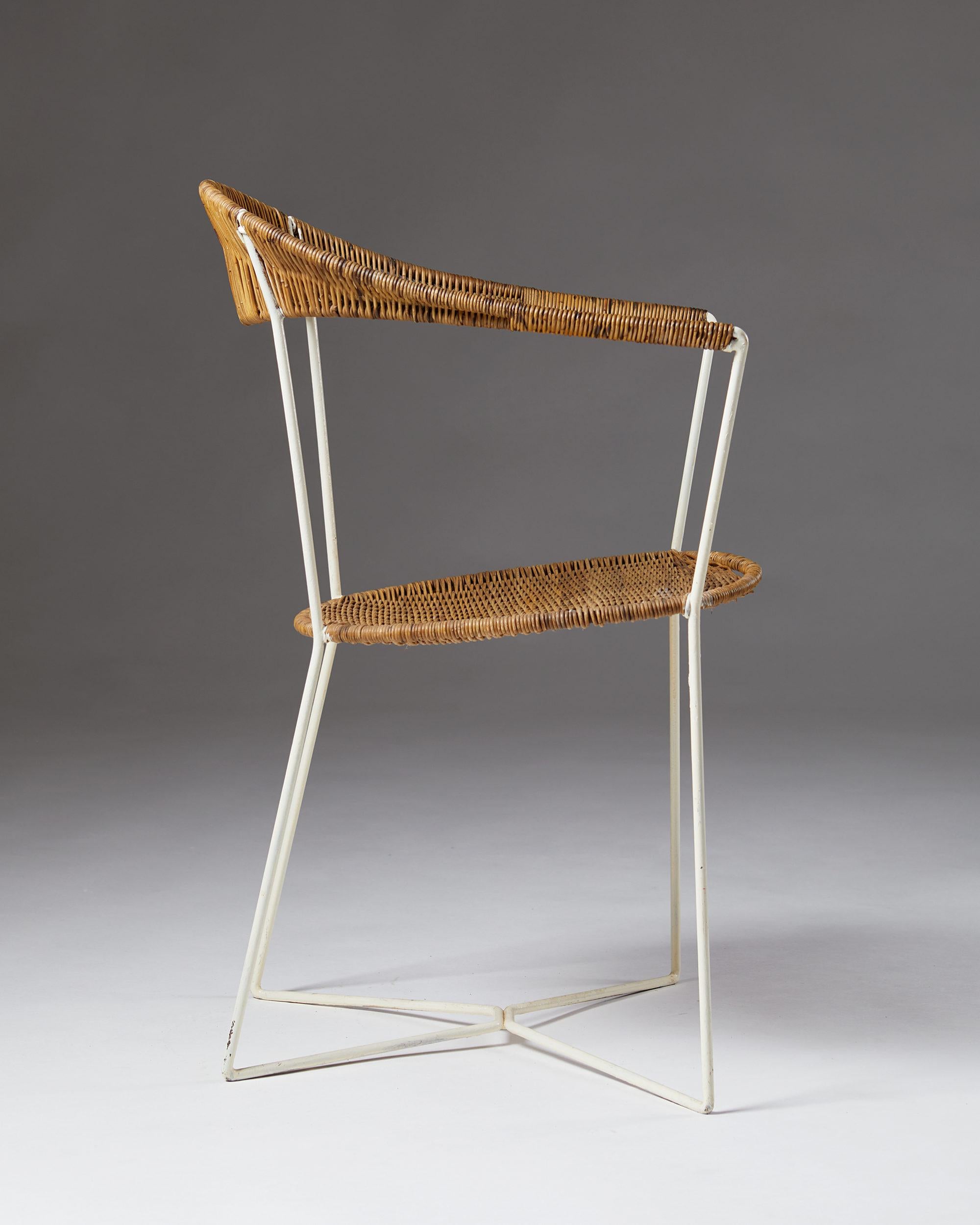 Armchair designed by Ivar Callmander
Sweden, 1920s.
Lacquered steel and cane.

Measures: H 82 cm / 2' 8 1/4