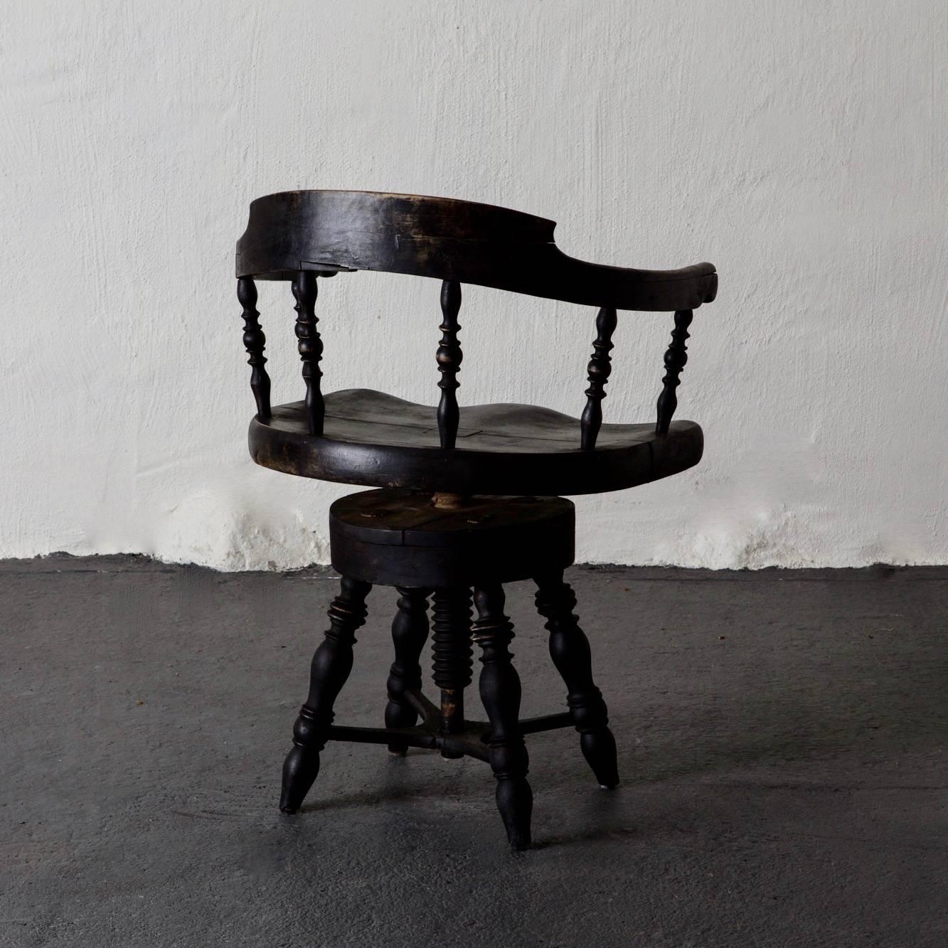 Armchair desk chair Swedish 19th century in black, Sweden. An armchair made during the late 19th century in Sweden. Adjustable height. Repainted in our custom paint Laserow black.
 